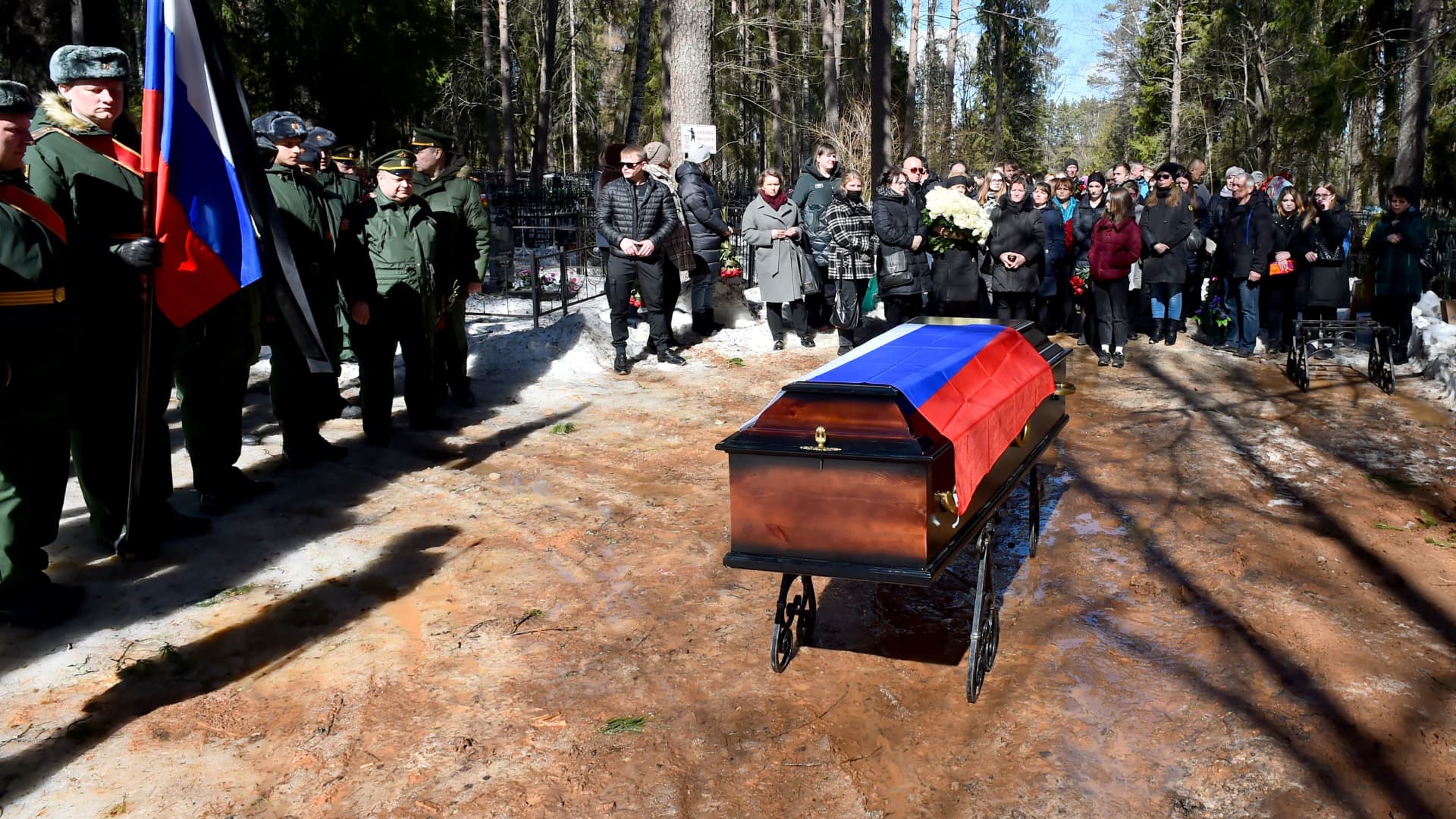 Family members and mourners gather during the funeral of 20-year-old Russian serviceman Nikita Avrov, at a church in Luga some 150kms south of Saint Petersburg on April 11, 2022, after his death on March 27, during the ongoing Russian invasion of Ukraine.