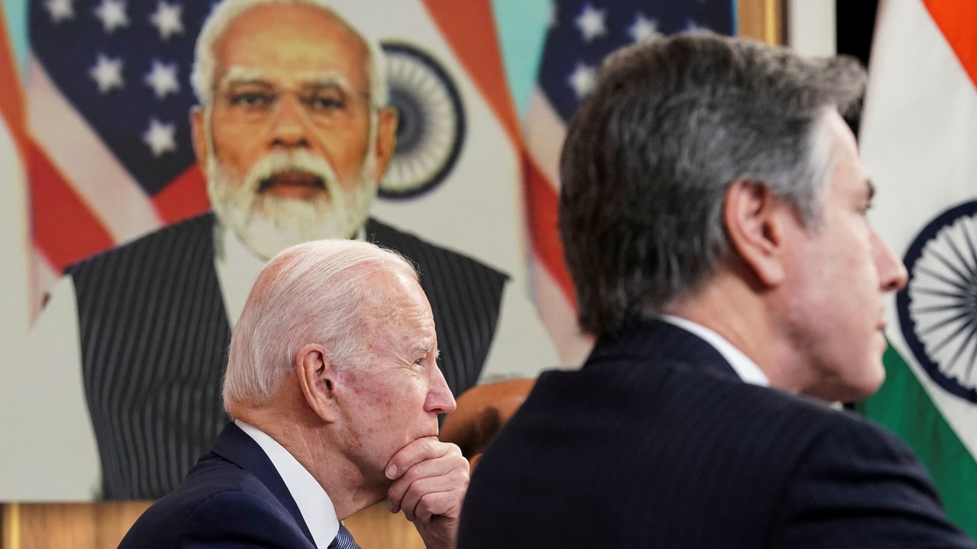 U.S. President Joe Biden holds virtual talks via videoconference with India's Prime Minister Narendra Modi, as U.S. Secretary of State Antony Blinken participates in the Eisenhower Executive Office Building's South Court Auditorium at the White House in Washington, U.S., April 11, 2022. 