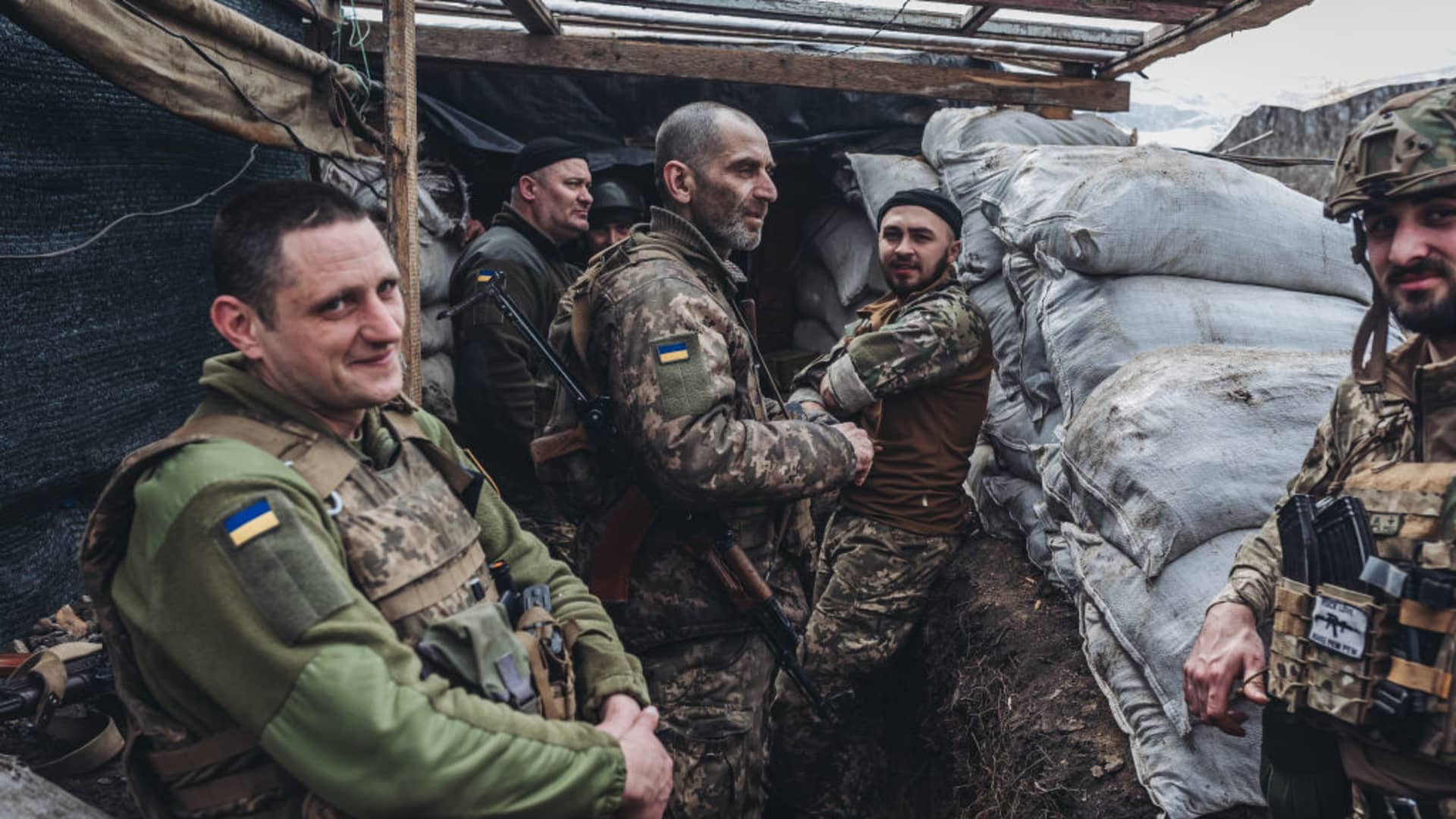 Ukrainian soldiers talk to each other at a Ukrainian frontline in Donbass, Ukraine on April 11, 2022. 