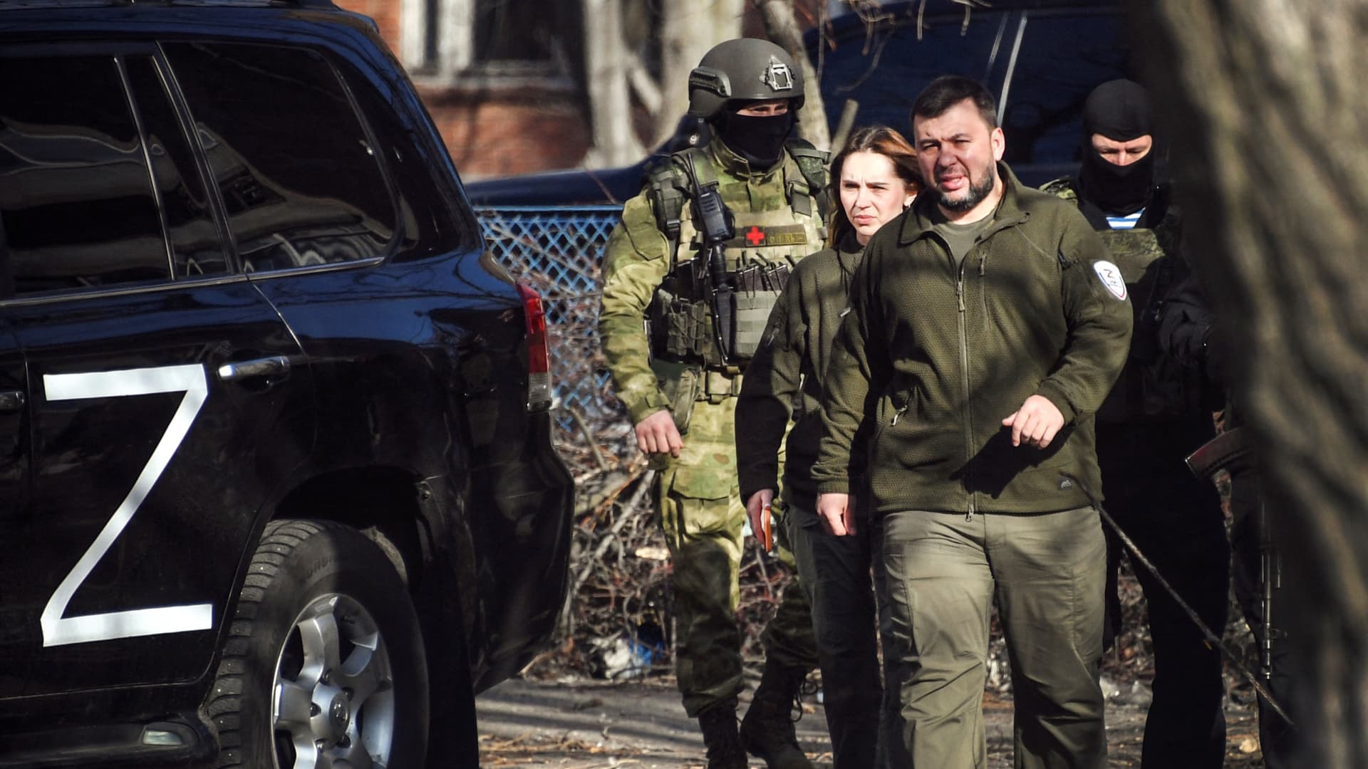 Denis Pushilin (C), leader of the separatists in the self-proclaimed Donetsk People's Republic (DNR) arrives to deliver a press conference in Donetsk, on April 11, 2022.