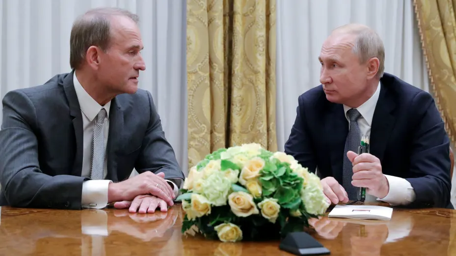 FILE PHOTO: Russia's President Vladimir Putin (R) attends a meeting with leader of Ukraine’s Opposition Platform - For Life party Viktor Medvedchuk in Saint Petersburg, Russia July 18, 2019. Sputnik/Mikhail Klimentyev/Kremlin via REUTERS  ATTENTION EDITORS - THIS IMAGE WAS PROVIDED BY A THIRD PARTY./File Photo