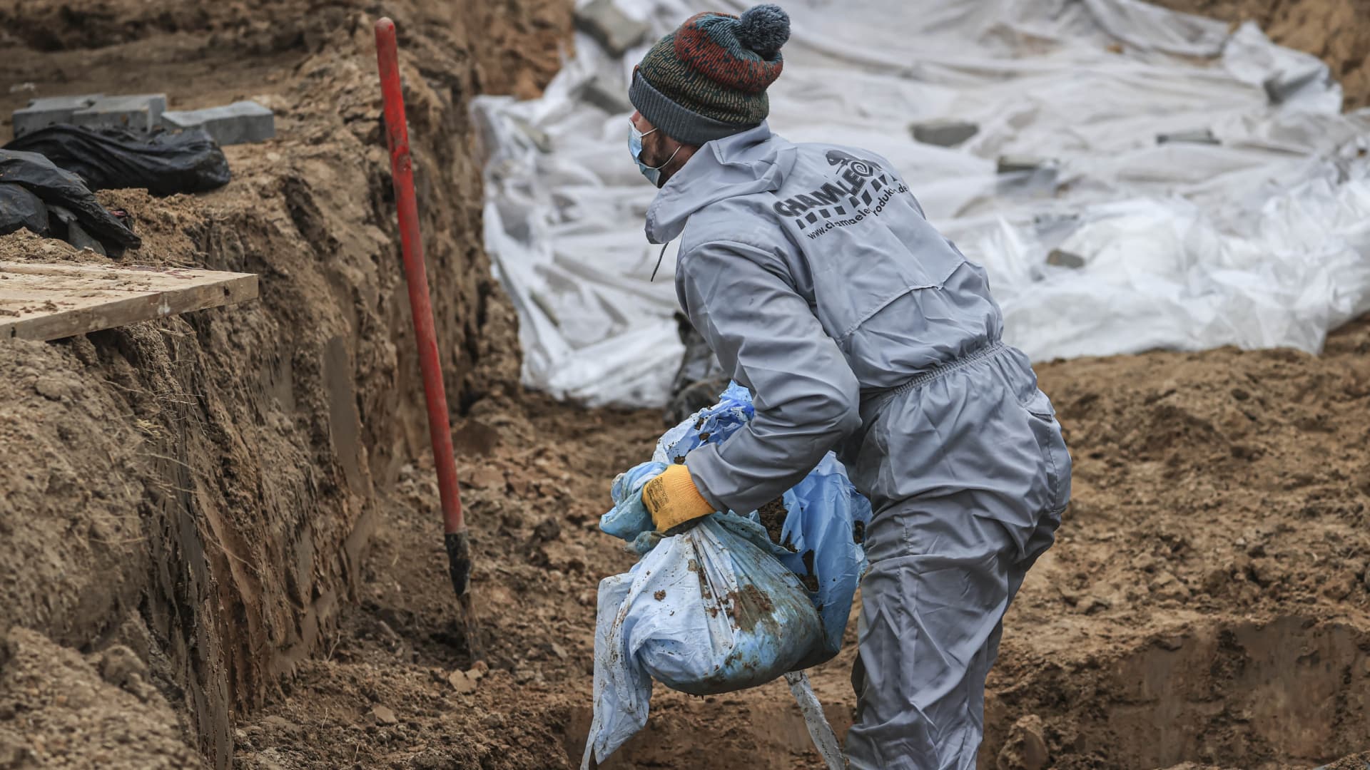 (EDITORS NOTE: Image depicts death) Officials continue to exhume the bodies of civilians who died during the Russian attacks, from second mass grave, found at backyard of St. Andrea's Church in Bucha, Kyiv Oblast, Ukraine on April 13, 2022. 