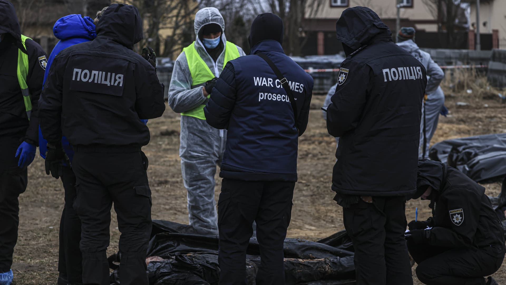 (EDITORS NOTE: Image depicts death) Officials continue to exhume the bodies of civilians who died during the Russian attacks, from second mass grave, found at backyard of St. Andrea's Church in Bucha, Kyiv Oblast, Ukraine on April 13, 2022. 