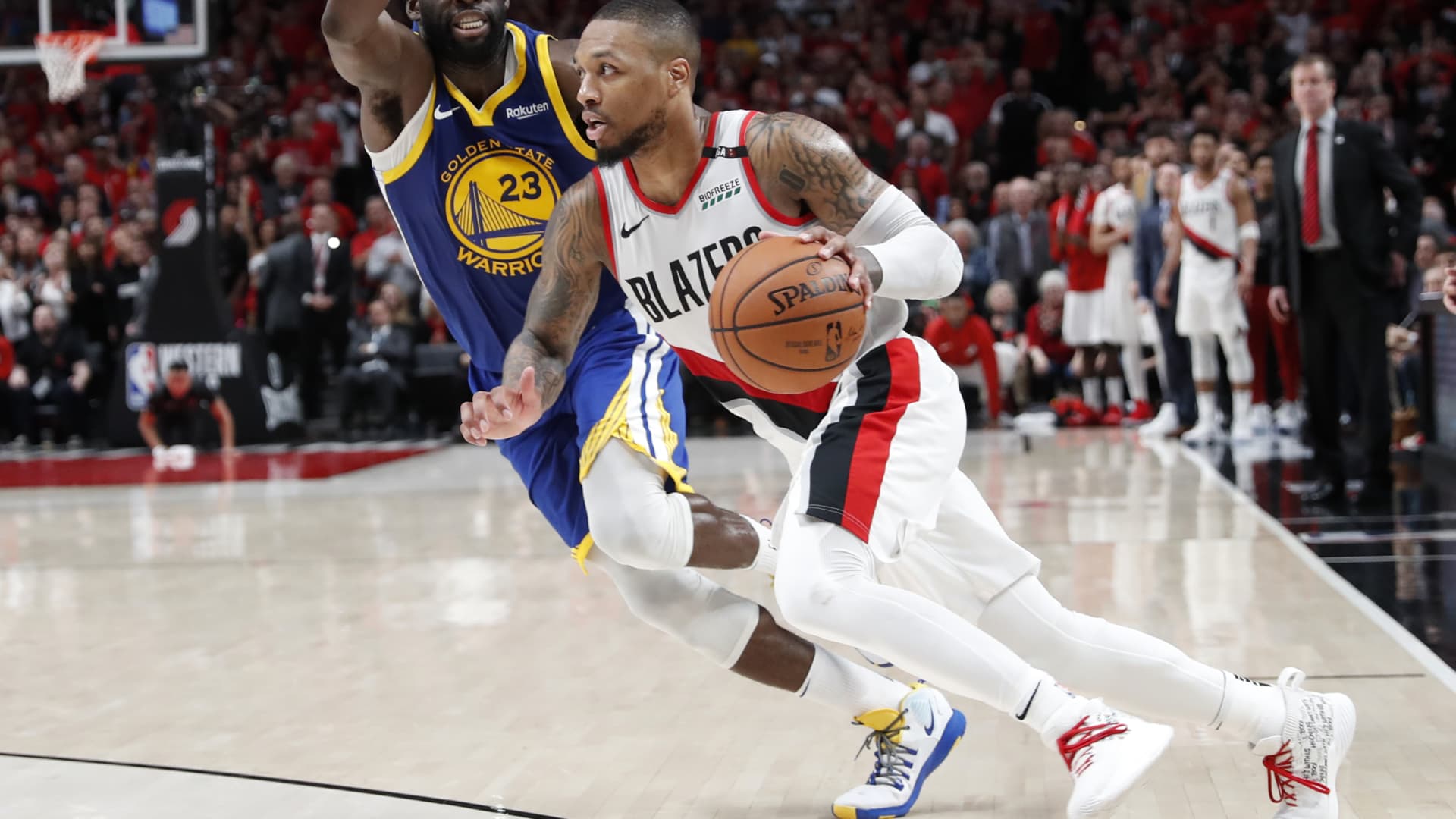 Golden State Warriors' Draymond Green guards Portland Trail Blazers' Damian Lillard in final seconds of Warriors' 119-117 overtime win in NBA Western Conference Finals' Game 4 at Moda Center in Portland, Oregon on Monday, May 20, 2019.