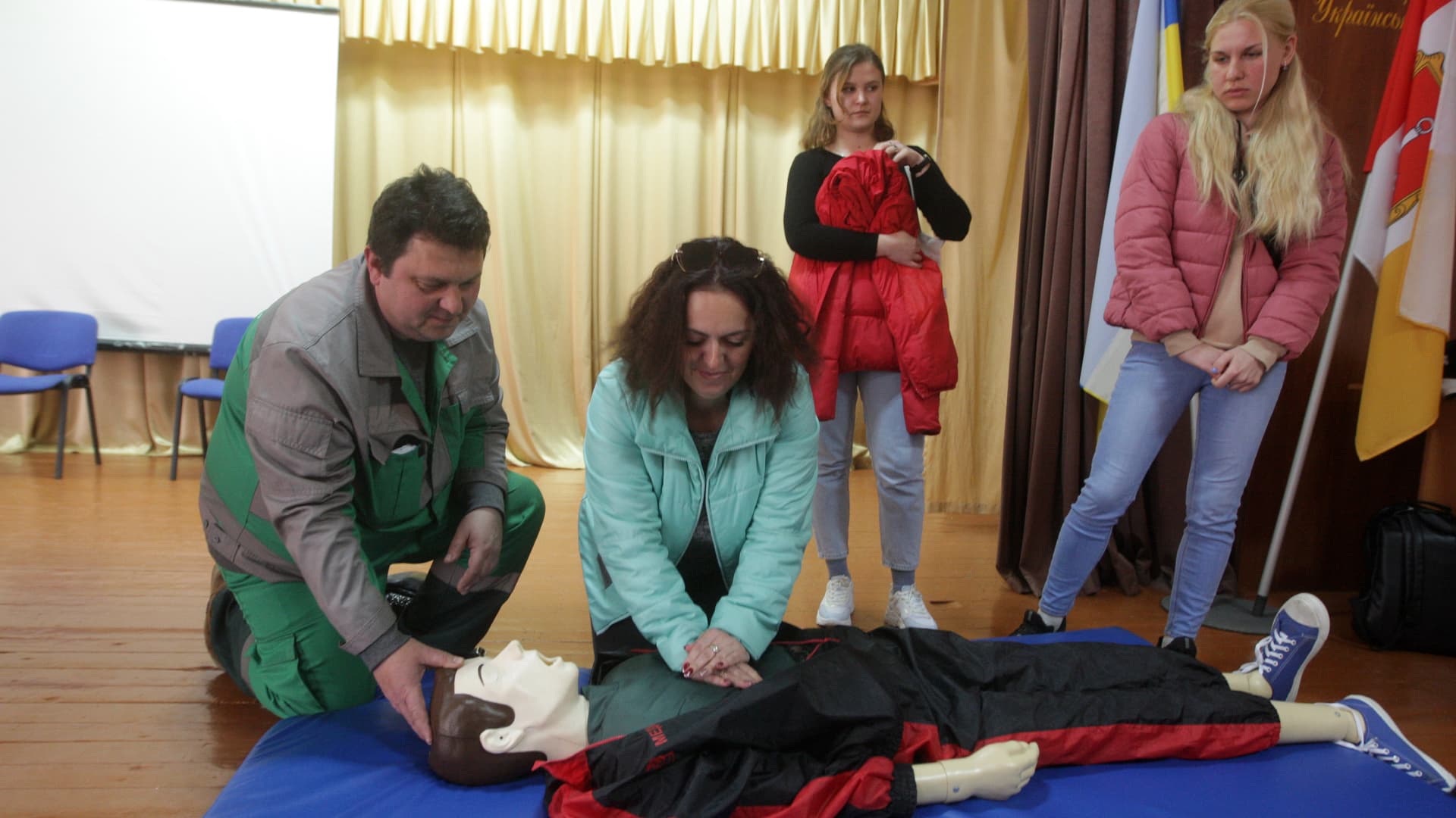 People attend a free lesson of the first aid care in Odessa, on April 13, 2022. 