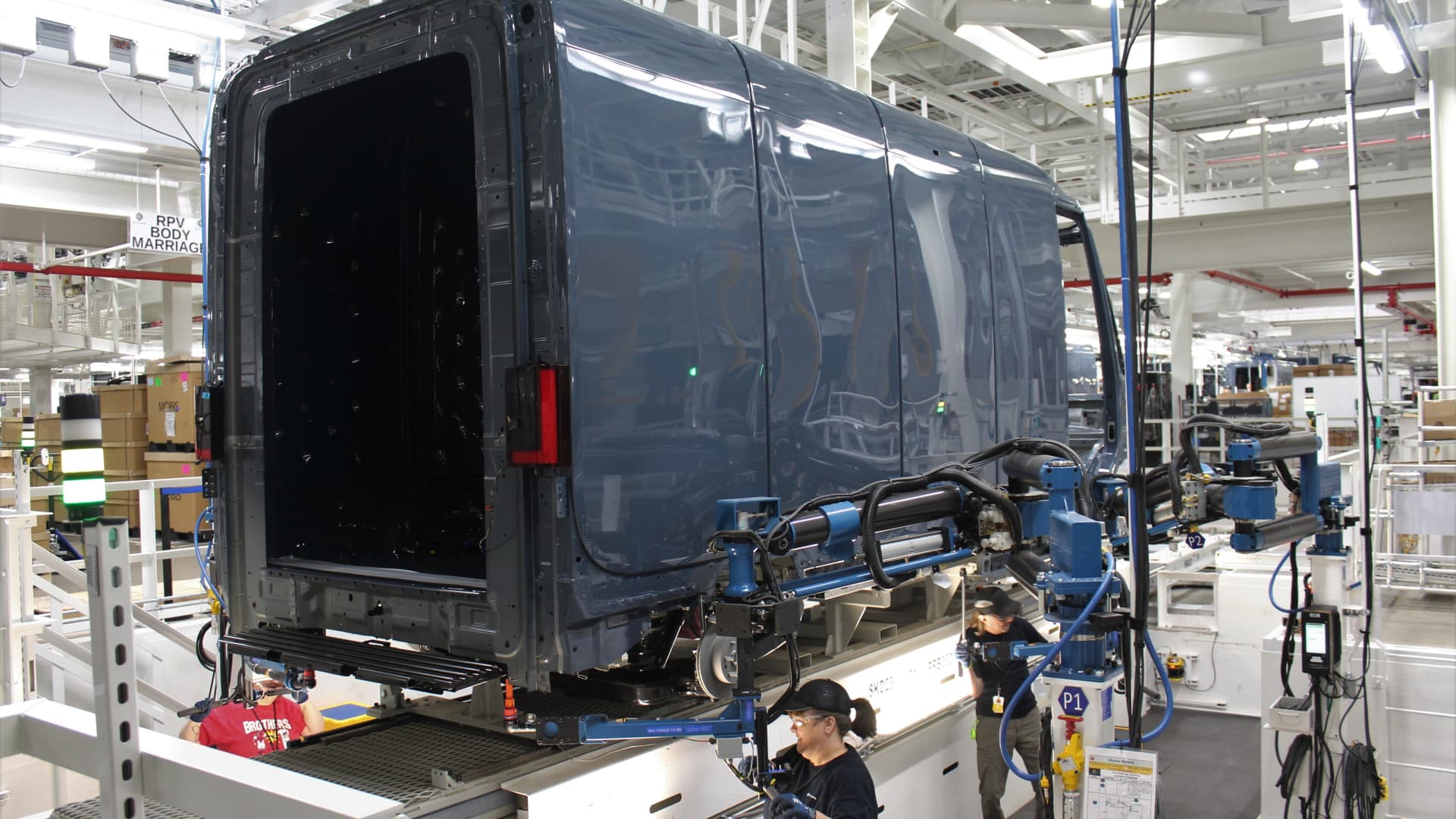 Production of electric Amazon delivery vans on April 11, 2022 at Rivian's plant in Normal, Ill.