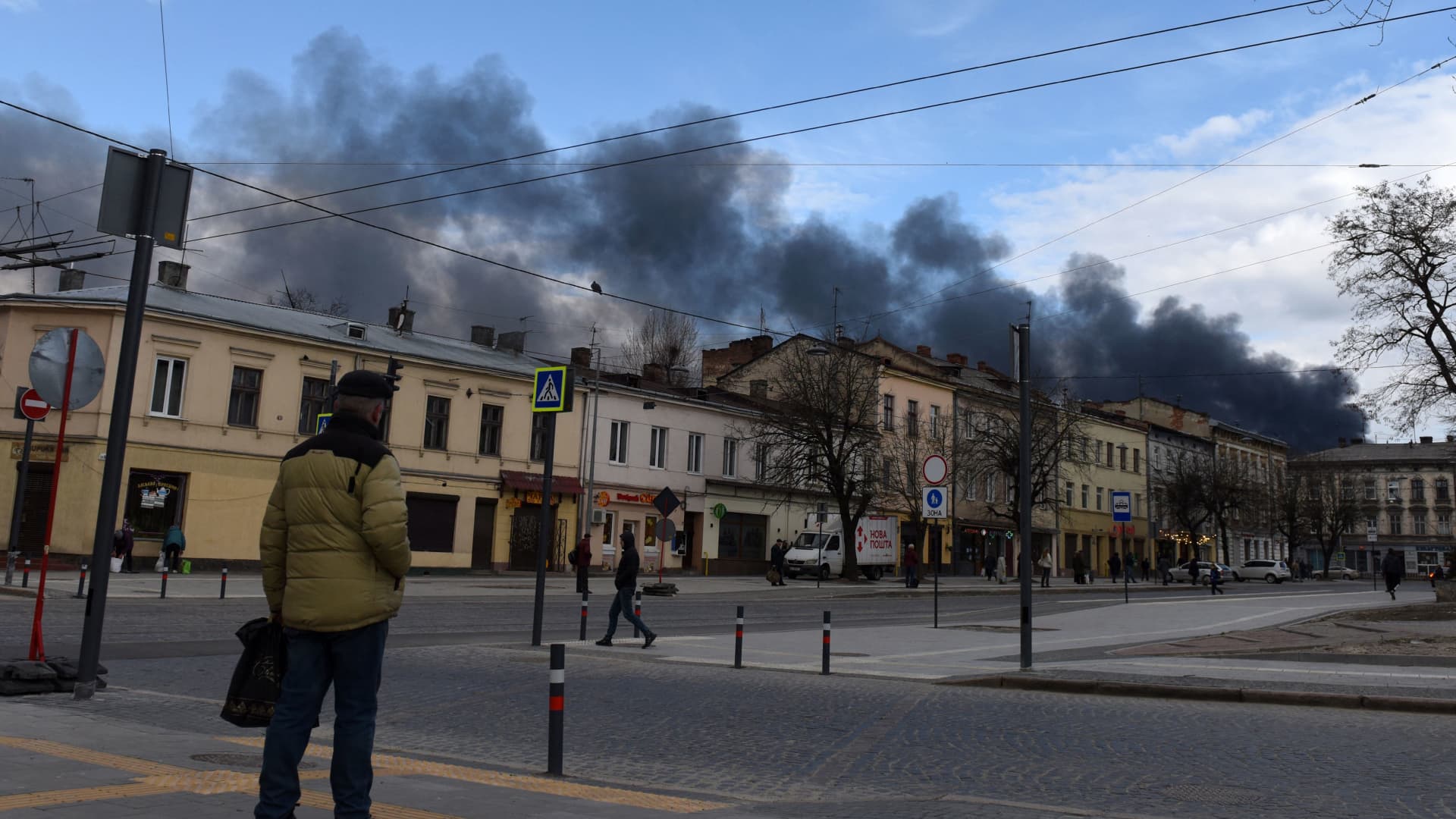 Dark smoke rises following an air strike in the western Ukrainian city of Lviv, on April 18, 2022.