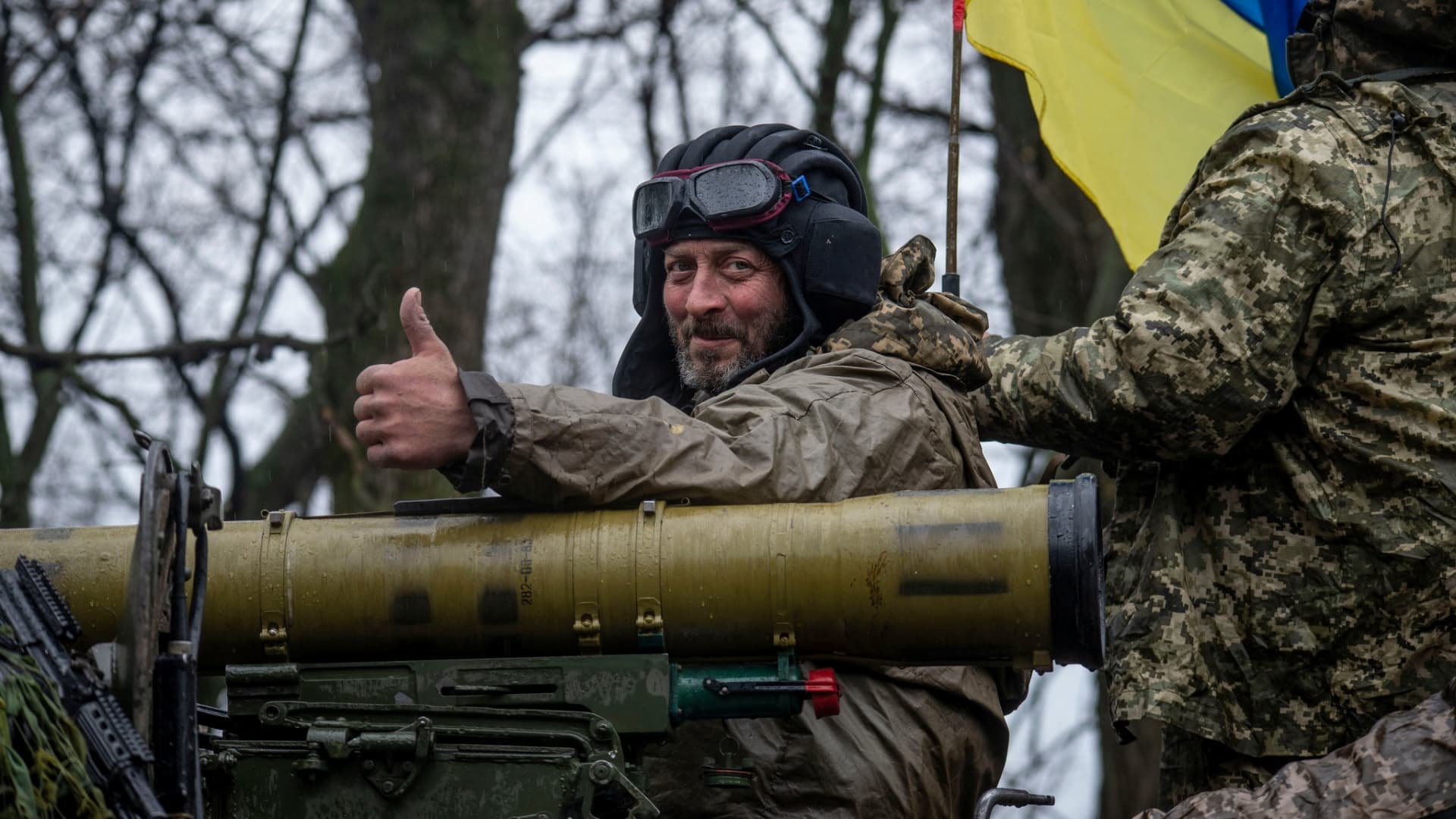 A Ukrainian serviceman rides atop an armored fighting vehicle, as Russia?s attack on Ukraine continues, at an unknown location in Eastern Ukraine, in this handout picture released April 19, 2022.