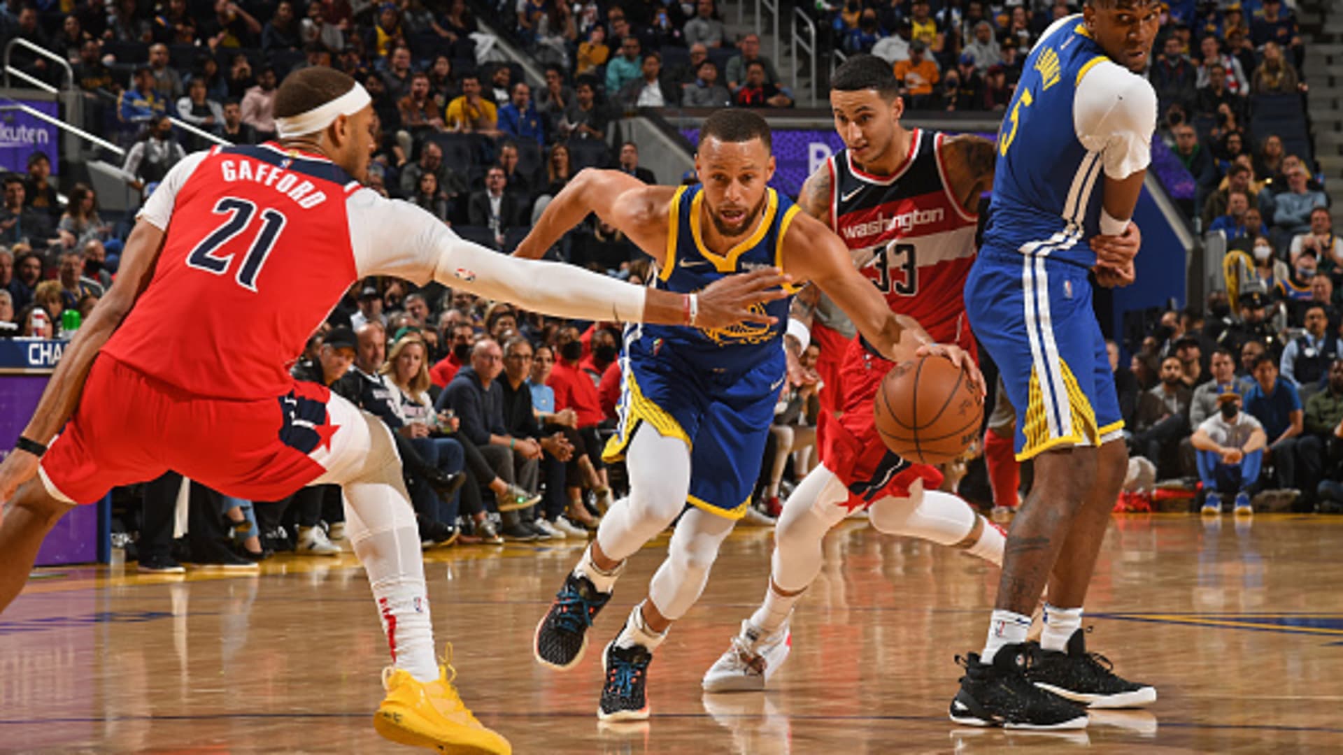 Stephen Curry #30 of the Golden State Warriors drives to the basket during the game against the Washington Wizards on March 14, 2022 at Chase Center in San Francisco, California.