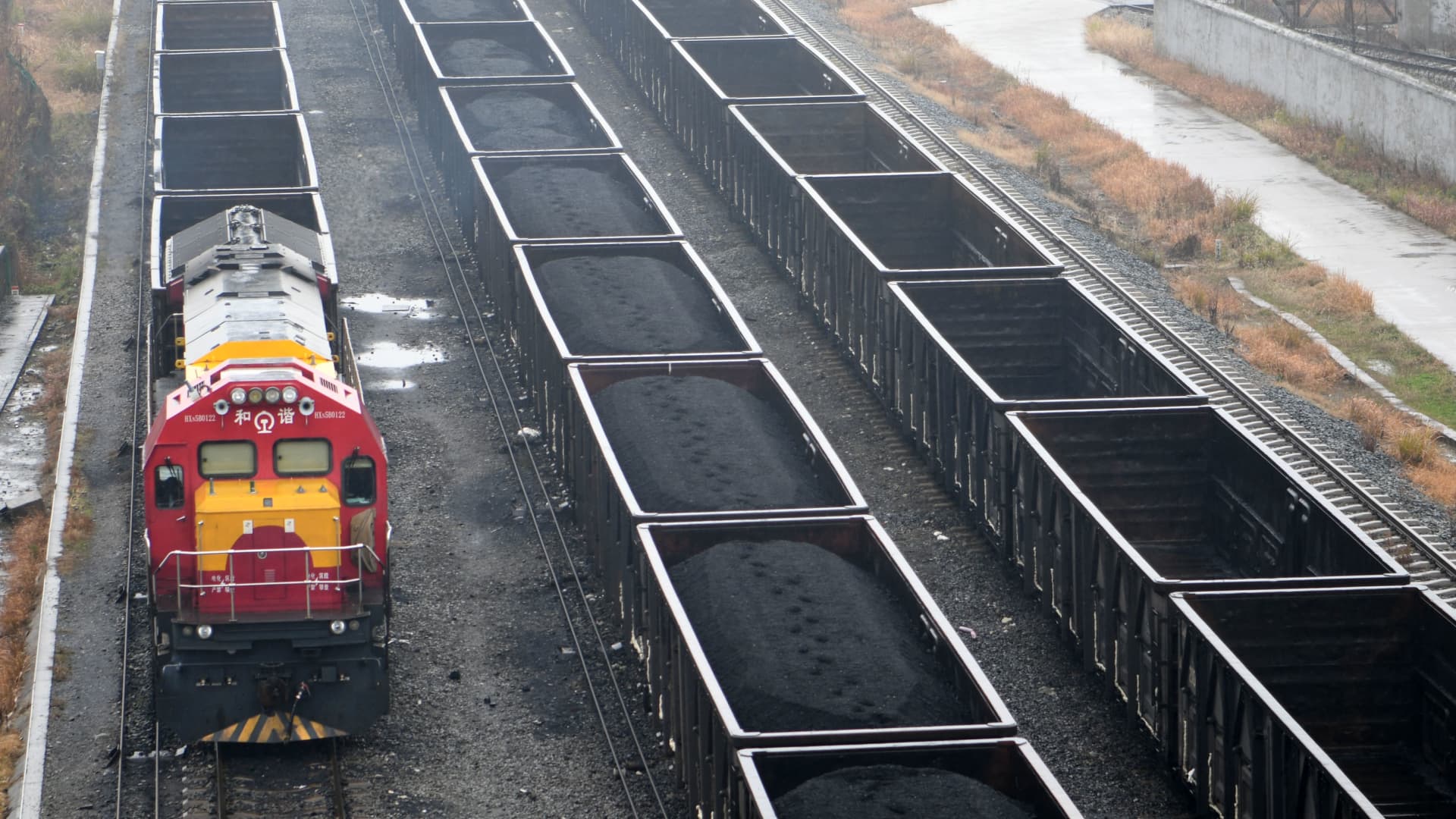 Employees work on a freight train loaded with coal at Jiangxi Coal Reserve Center on January 29, 2022 in China. China imported 30% less coal from Russia year-on-year in March, according to Reuters.