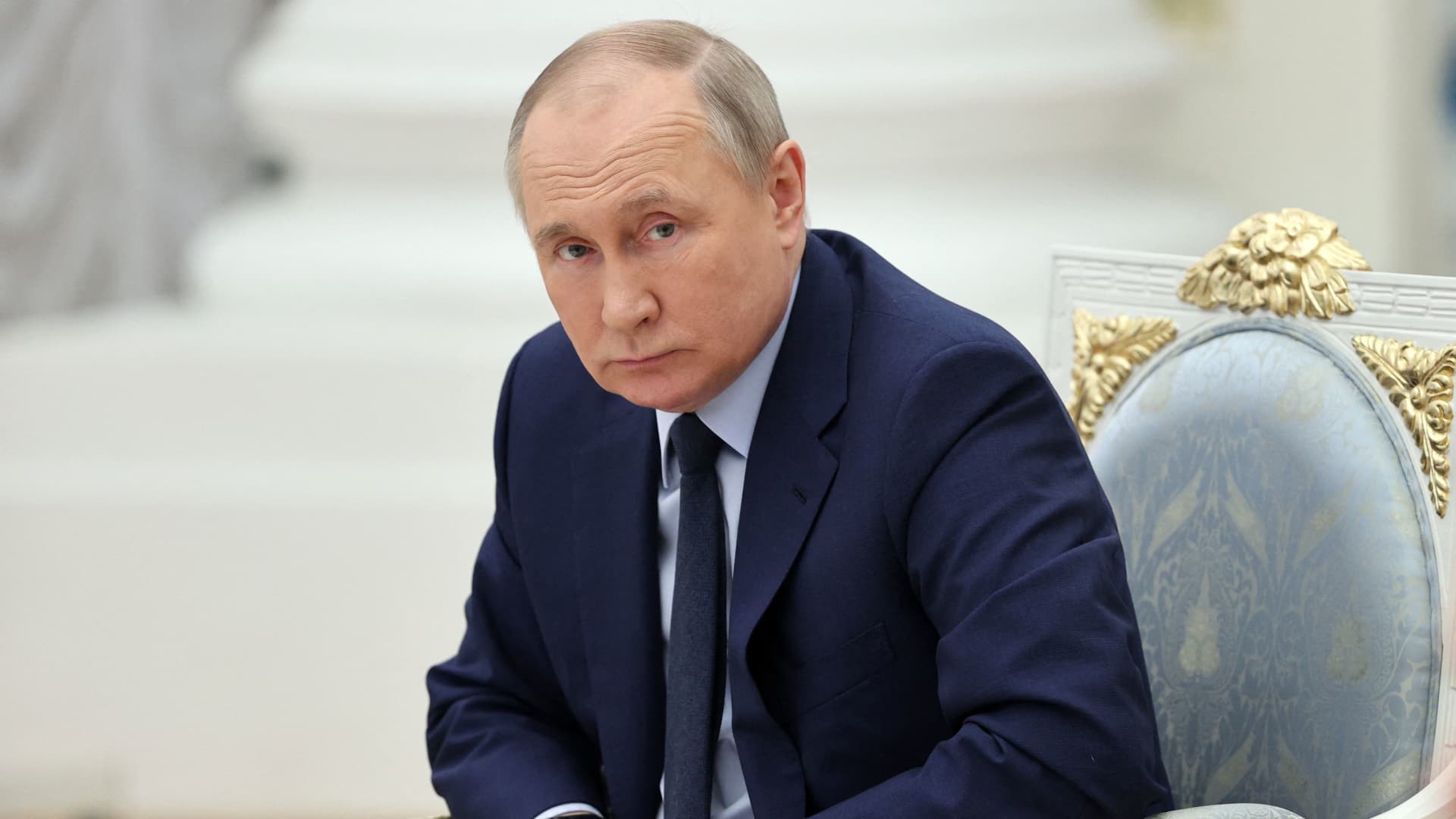 Russian President Vladimir Putin looks on as he holds a meeting of the Russia - Land of Opportunity platform supervisory board at the Catherine's Hall of the Kremlin in Moscow on April 20, 2022.