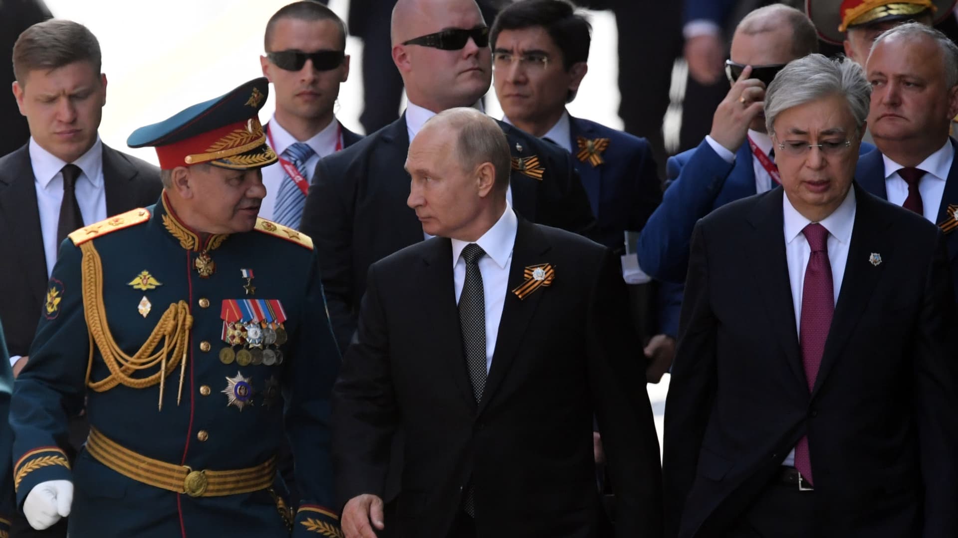 Russian President of Russia and Commander-in-Chief of the Armed Forces Vladimir Putin (C) and Russian Defense Minister Sergei Shoigu (L) and President of Kazakhstan Kassym-Jomart Tokayev (R) during a Victory Day military parade marking the 75th anniversary of the victory in World War II, on June 24, 2020 in Moscow, Russia.