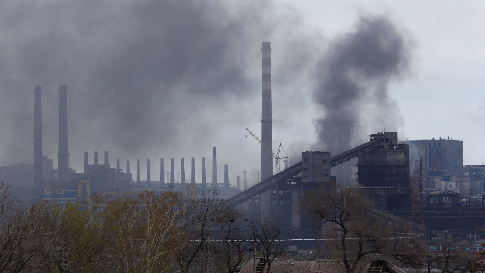 Smoke rises above a plant of Azovstal Iron and Steel Works during Ukraine-Russia conflict in the southern port city of Mariupol, Ukraine April 21, 2022.
