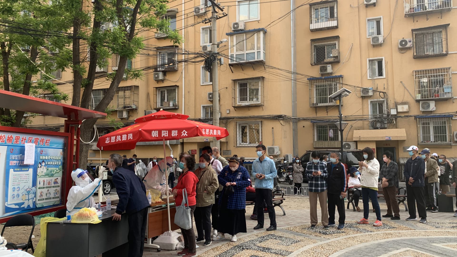 China's capital city of Beijing reported a spike in Covid cases over the weekend and began mass testing Monday in the business district of Chaoyang. Within the district, one community that's pictured here became classified as a high-risk area.