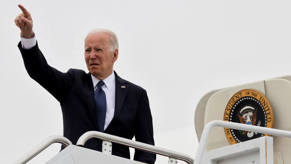 U.S. President Joe Biden gestures as he boards Air Force One at Delaware Air National Guard Base, in New Castle, Delaware, U.S., April 25, 2022.  REUTERS/Tasos Katopodis