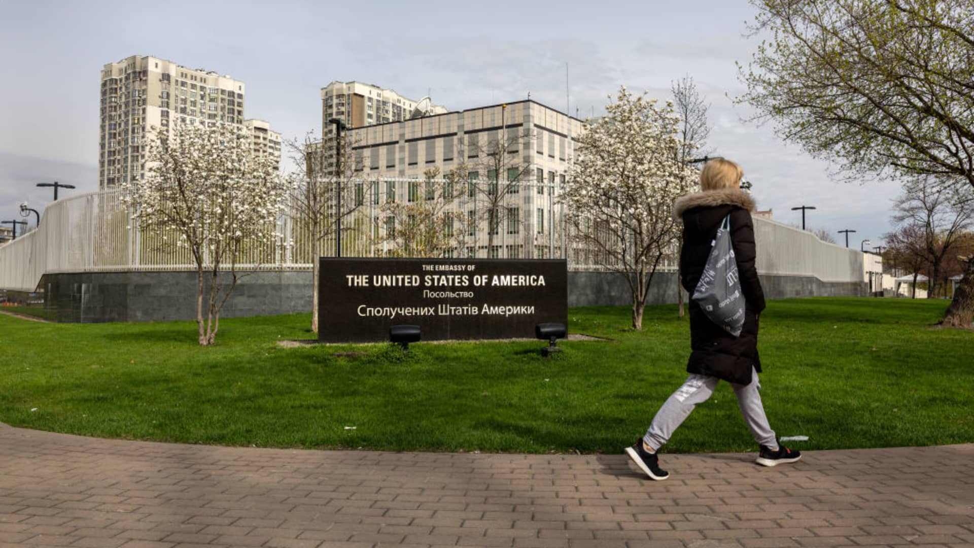 A woman walks past the closed United States Embassy to Ukraine on April 25, 2022 in Kyiv, Ukraine.