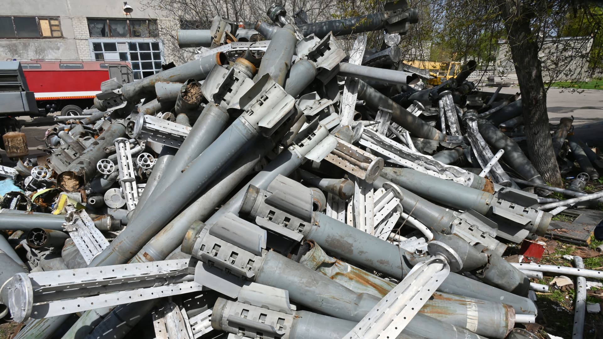 A photograph taken on April 25, 2022 shows a pile of missile remains, collected by members of the State Emergency Service of Ukraine after shellings in Kharkiv, amid the Russian invasion of Ukraine.