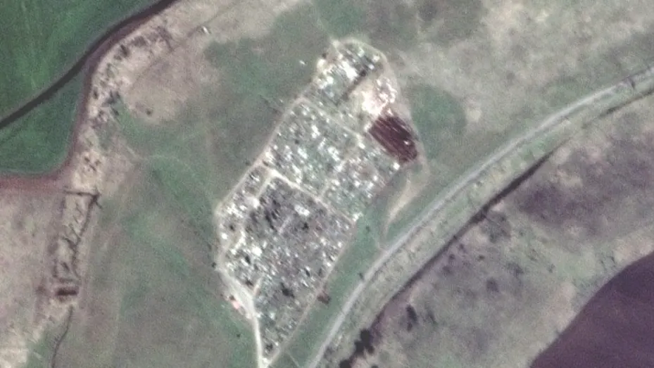Maxar satellite imagery of another mass grave site expansion just outside of Vynohradne, Ukraine -- just east of Mariupol. Sequence -- 3 of 4 images.