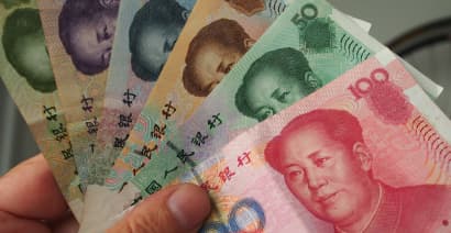 China's central bank steps in to slow the rapidly weakening yuan