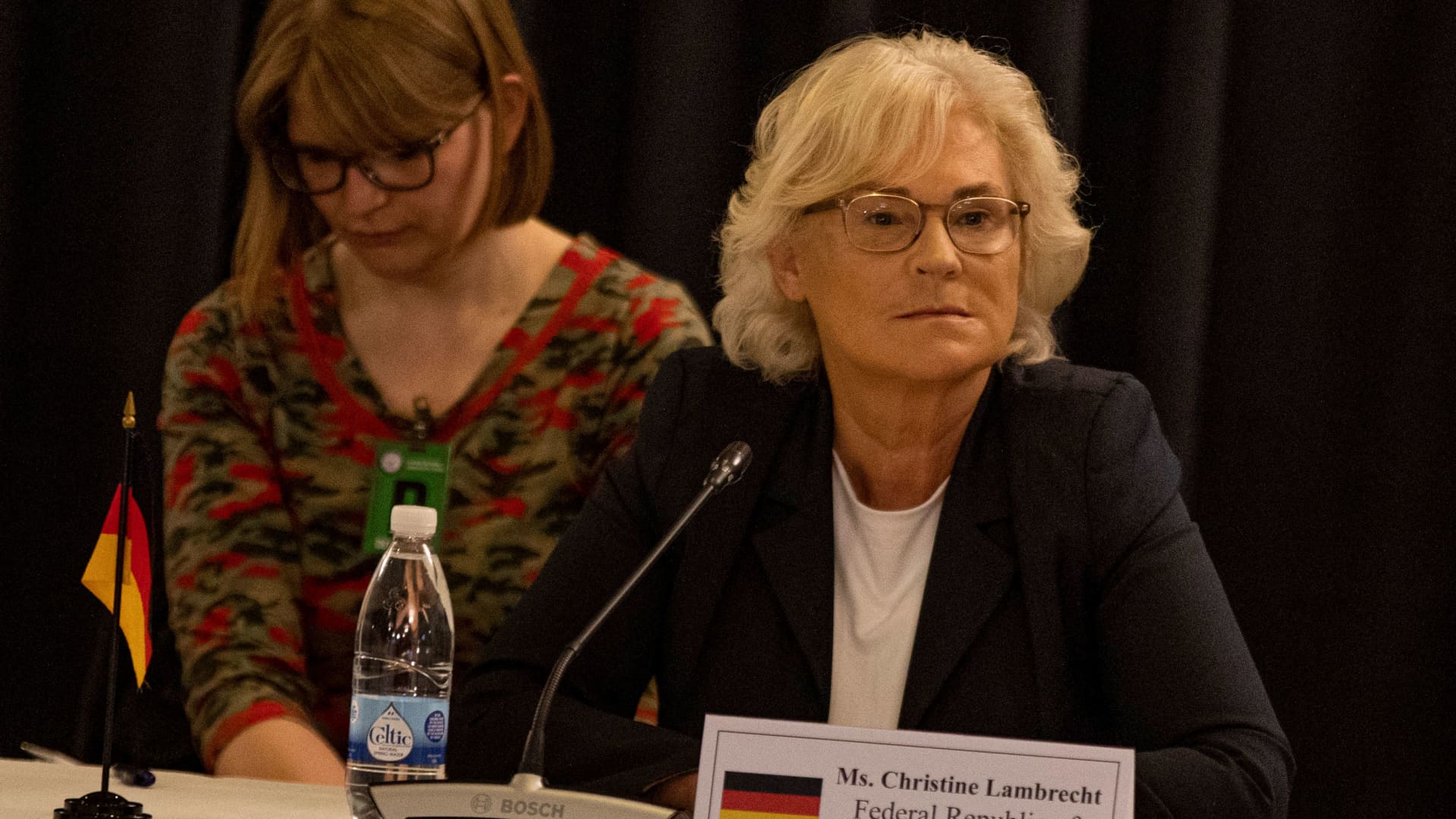 German Defence Minister Christine Lambrecht (R) attends a meeting with members of a Ukraine Security Consultative Group at the US Air Base in Ramstein, western Germany, on April 26, 2022.