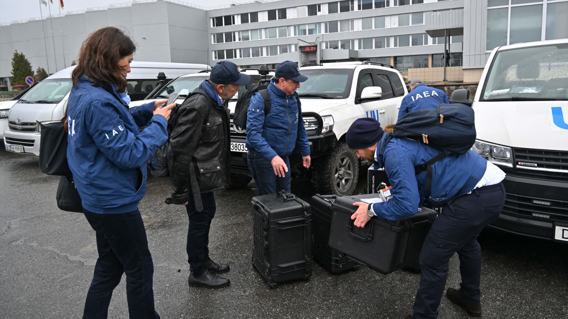 International Atomic Energy Agency (IAEA) employees unload equipments outside Chernobyl Nuclear Power Plant on April 26, 2022 on the 36th anniversary of the world's worst nuclear disaster. 