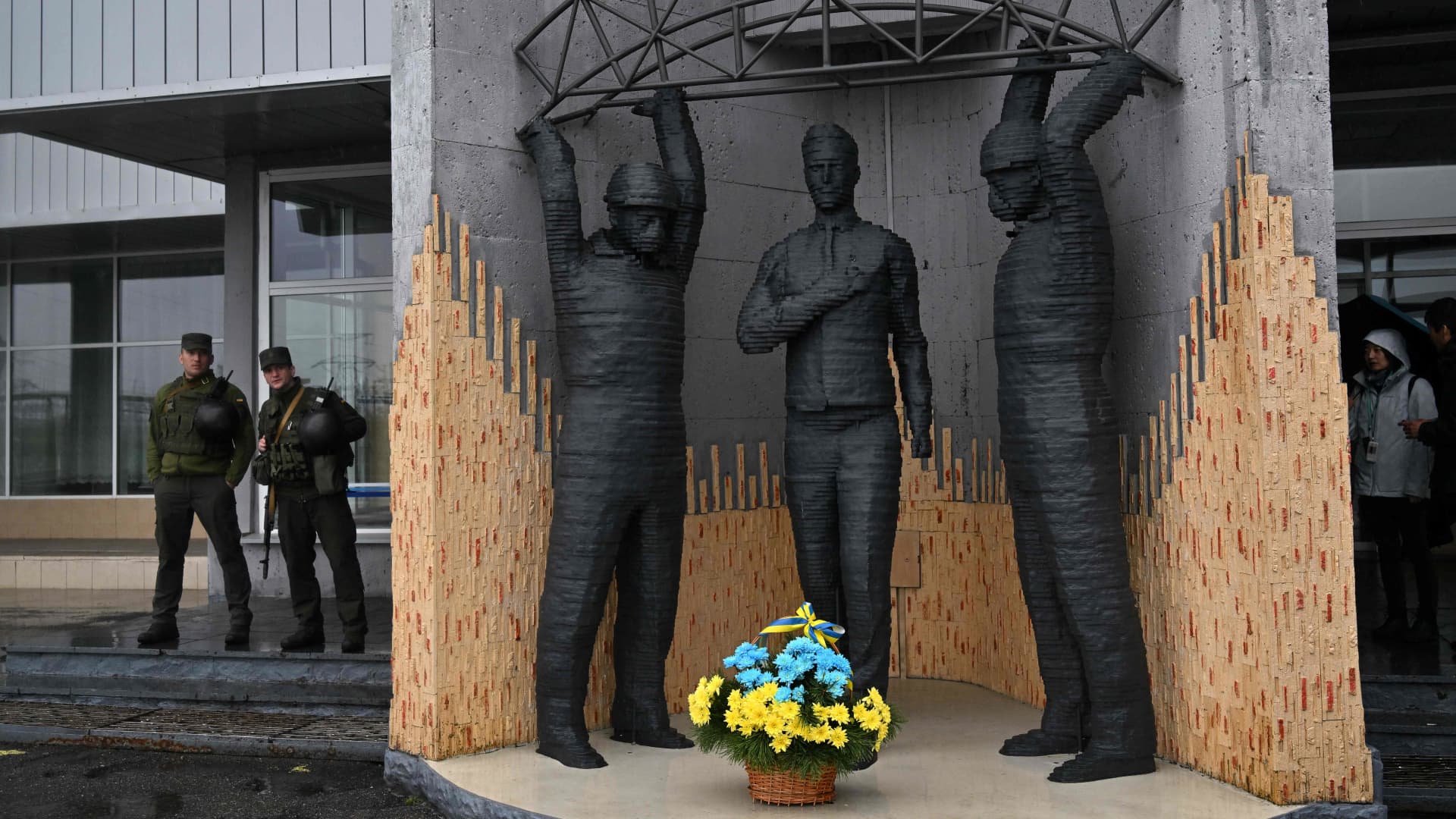 Ukrainian National Guard of Ukraine servicemen stand guard at entrance to Chernobyl Nuclear Power Plant Chernobyl Nuclear Power Plant on April 26, 2022 on the 36th anniversary of the world's worst nuclear disaster. 