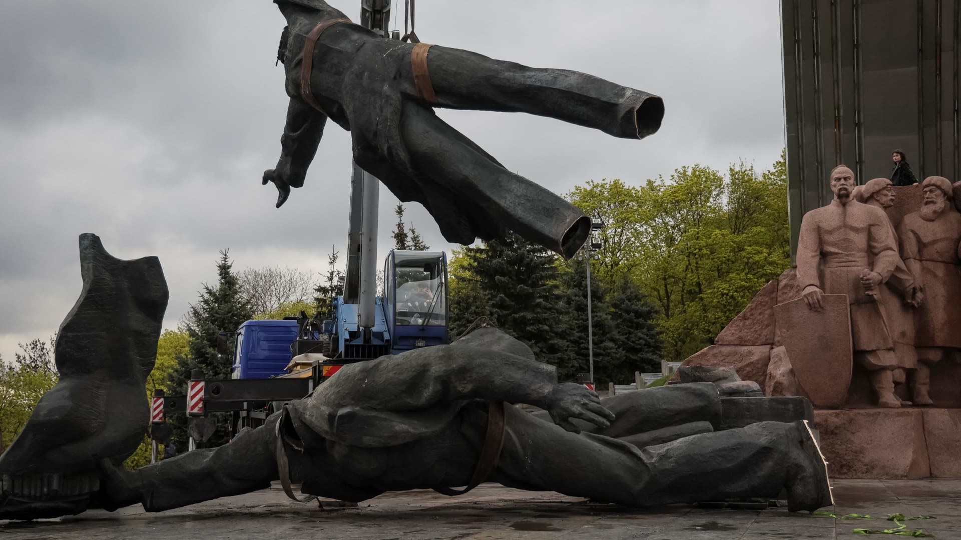 A Soviet monument to a friendship between Ukrainian and Russian nations is seen during its demolition, amid Russia's invasion of Ukraine, in central Kyiv, Ukraine April 26, 2022.
