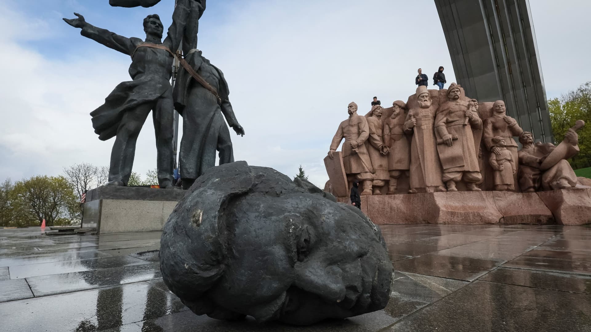 A Soviet monument to a friendship between Ukrainian and Russian nations is seen during its demolition, amid Russia's invasion of Ukraine, in central Kyiv, Ukraine April 26, 2022.