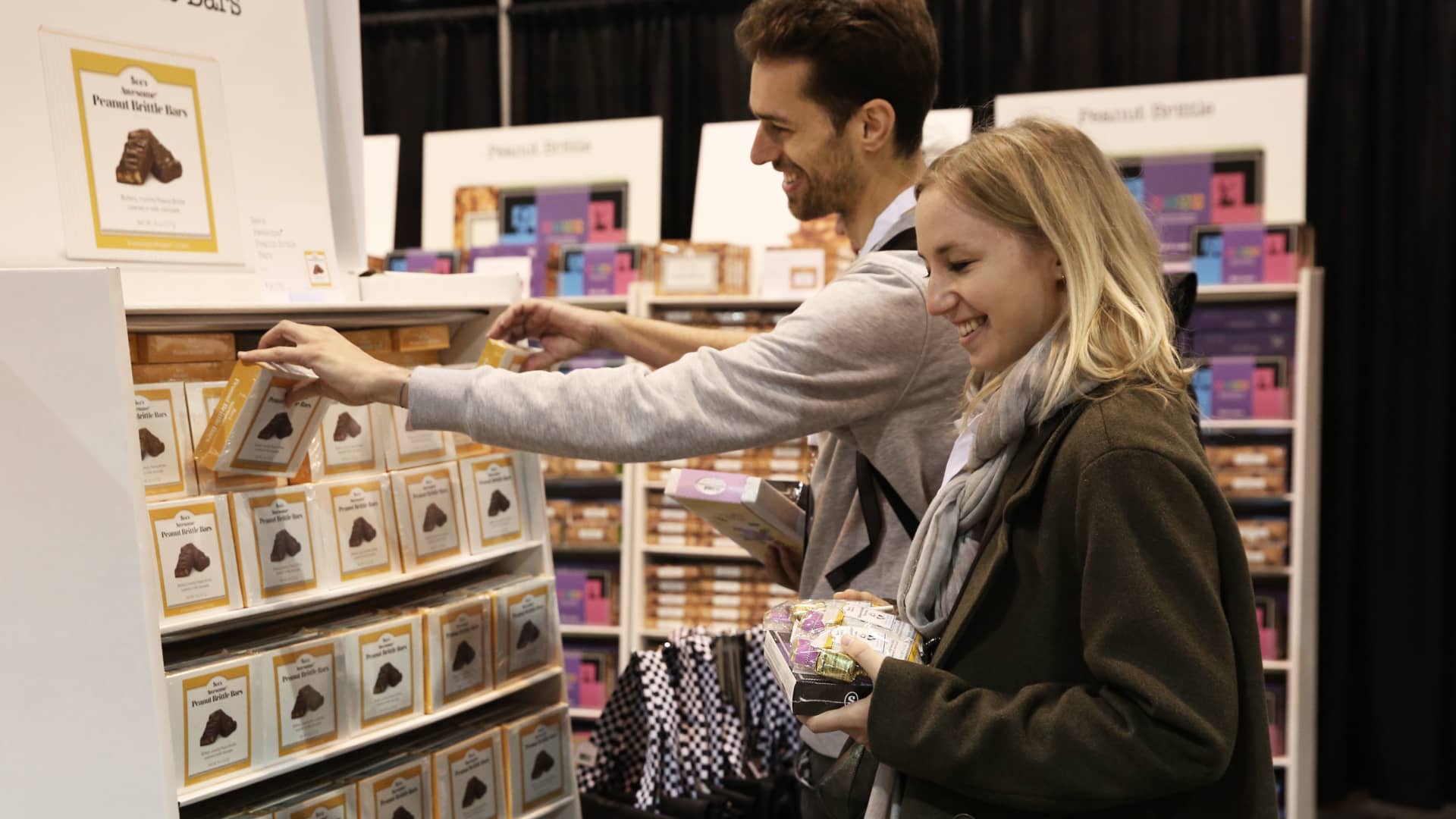 People shopping for See's Candies at the Berkshire Hathaway Annual Shareholders Meeting in Omaha, Nebraska.