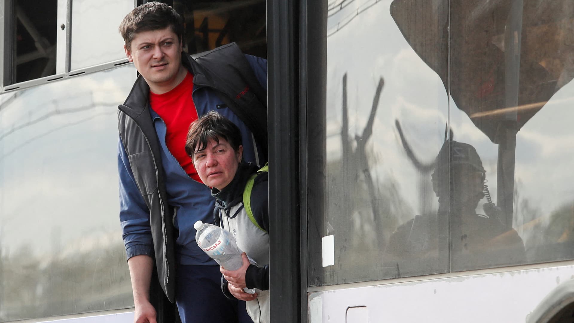Civilians who left the area near Azovstal steel plant in Mariupol look out of a bus near a temporary accommodation centre during Ukraine-Russia conflict in the village of Bezimenne in the Donetsk Region, Ukraine May 1, 2022. 