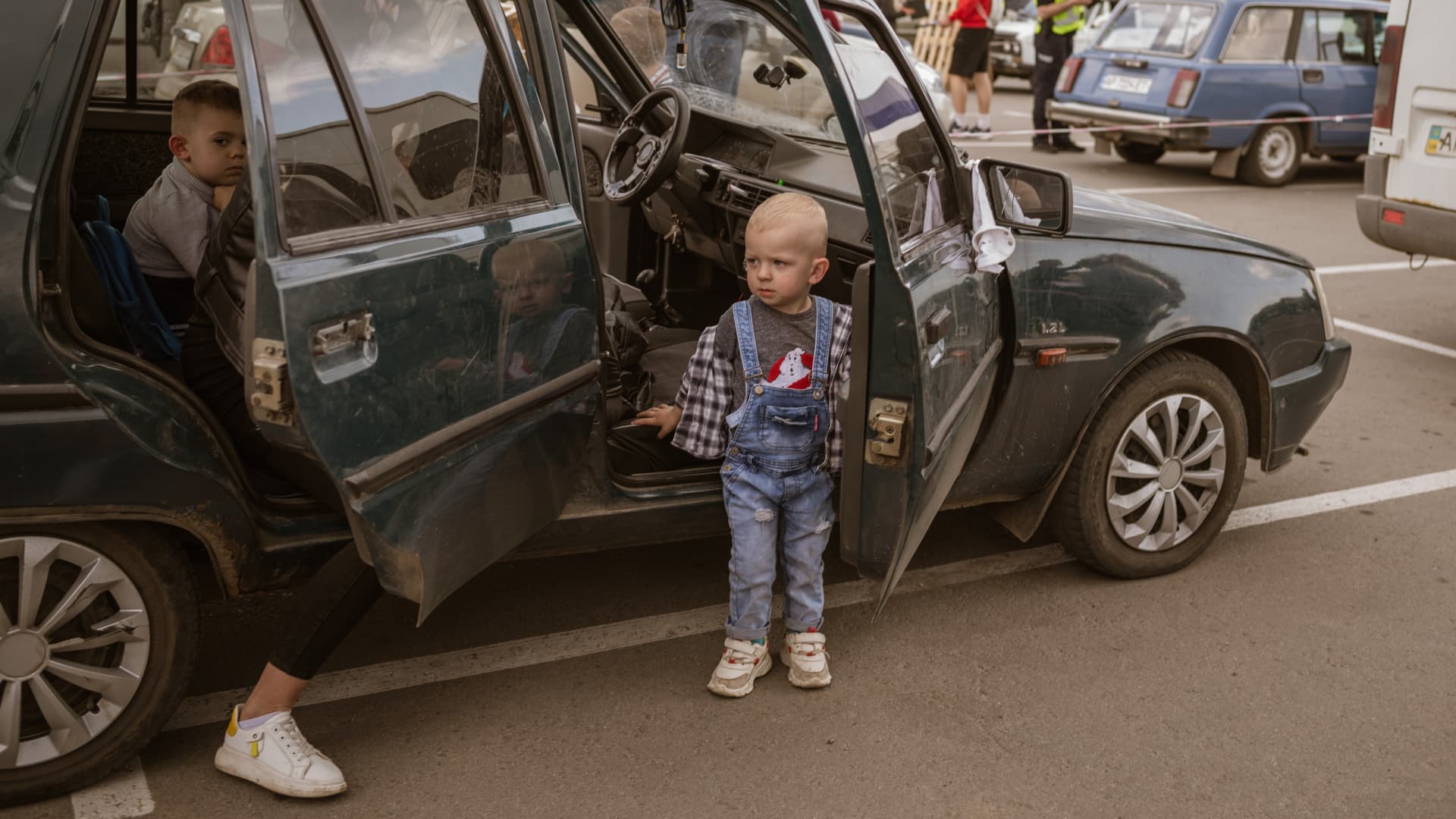 Evacuation centre that recieves people fleeing inside Zaporizhzhia region and Mariupol. Cars and vans arrive with IDPs from several cities and villages most from russian occupied territories. Family with several children.