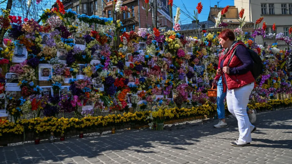 LVIV, UKRAINE- MAY 03: A man views the flower memorial wall in memory of the victims of Russia's attacks in Lviv, Ukraine on May 03, 2022. (Photo by Omar Marques/Anadolu Agency via Getty Images)