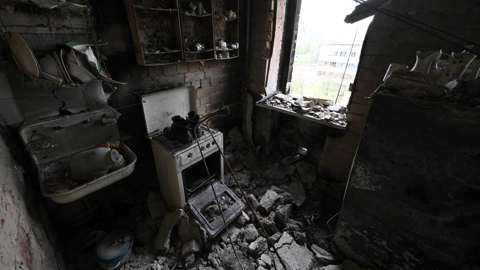 A photograph taken on May 3, 2022 shows a charred kitchen in of a destroyed flat in a heavily damaged residential building in the northern Ukrainian city of Chernihiv, amid the Russian invasion of Ukraine.