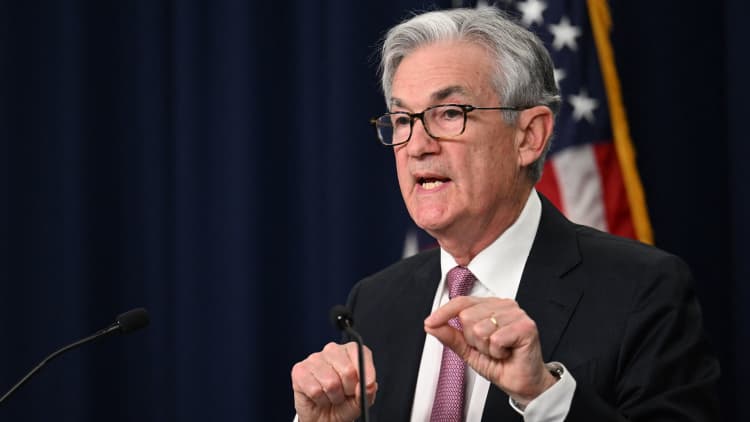 Fed raises interest rates by half a point, and market takes off