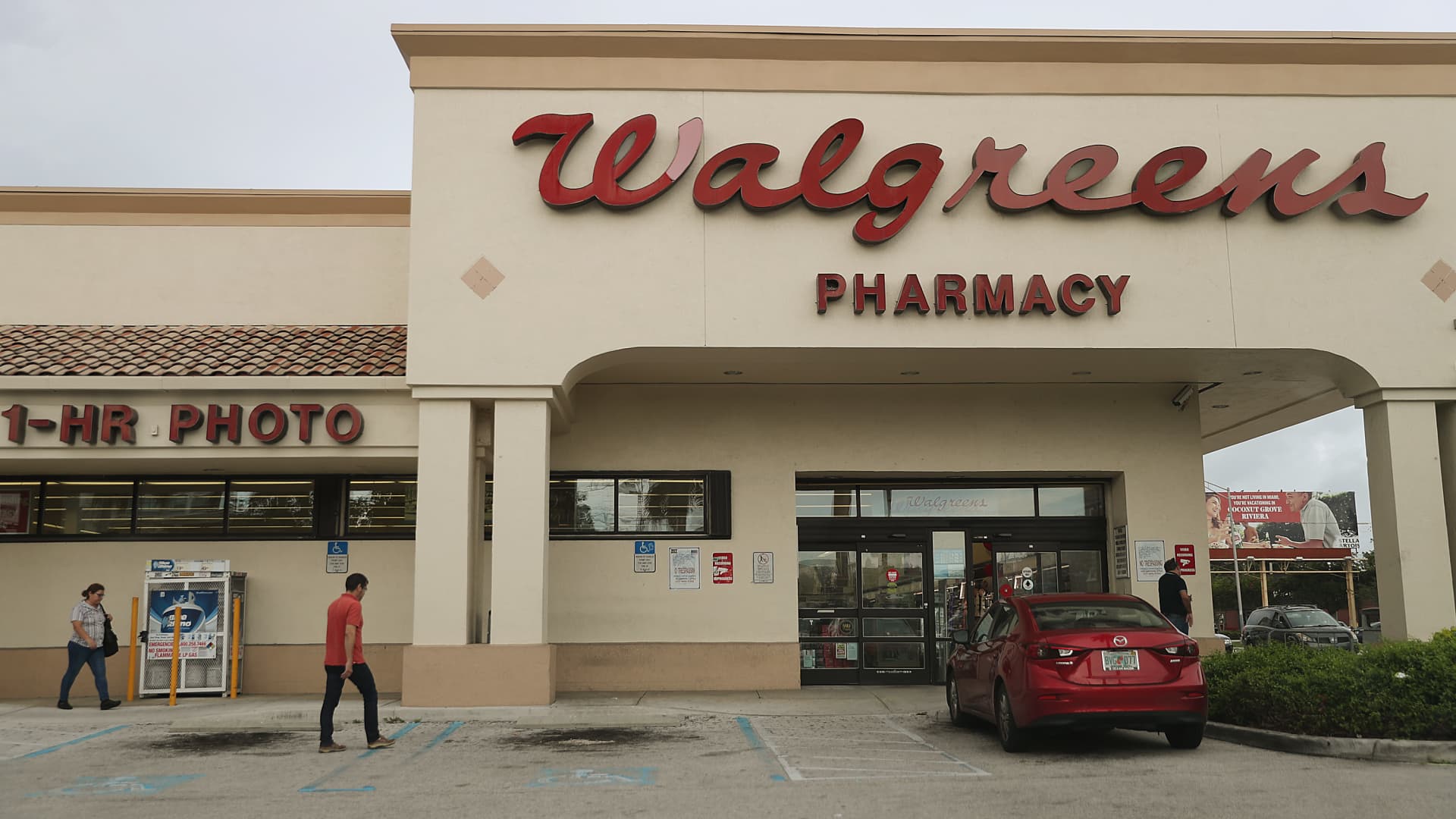 Shares making the largest strikes noon: Walgreens, Coinbase, Duolingo, Ralph Lauren and extra
