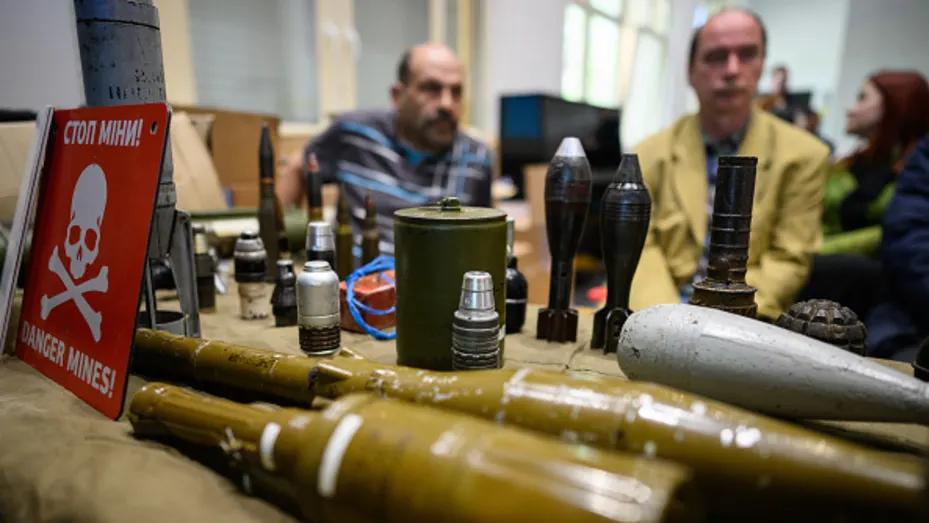 A range of munitions are seen a a group of people, many refugees, attend a lesson on recognising munitions and explosives, organised by the Main Directorate of the State Emergency Service of Ukraine on May 05, 2022 in Lviv, Ukraine.