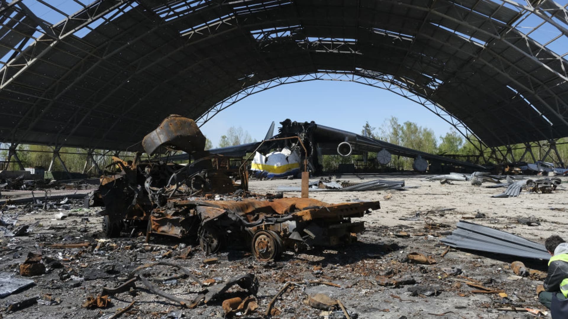 A view of the wreckage of the Antonov An-225 Mriya, the world's largest cargo plane, at an airshed after it was destroyed by Russia's attacks on Ukraine as cleaning works continue at Antonov Airport in Hostomel, Ukraine on May 5, 2022. 