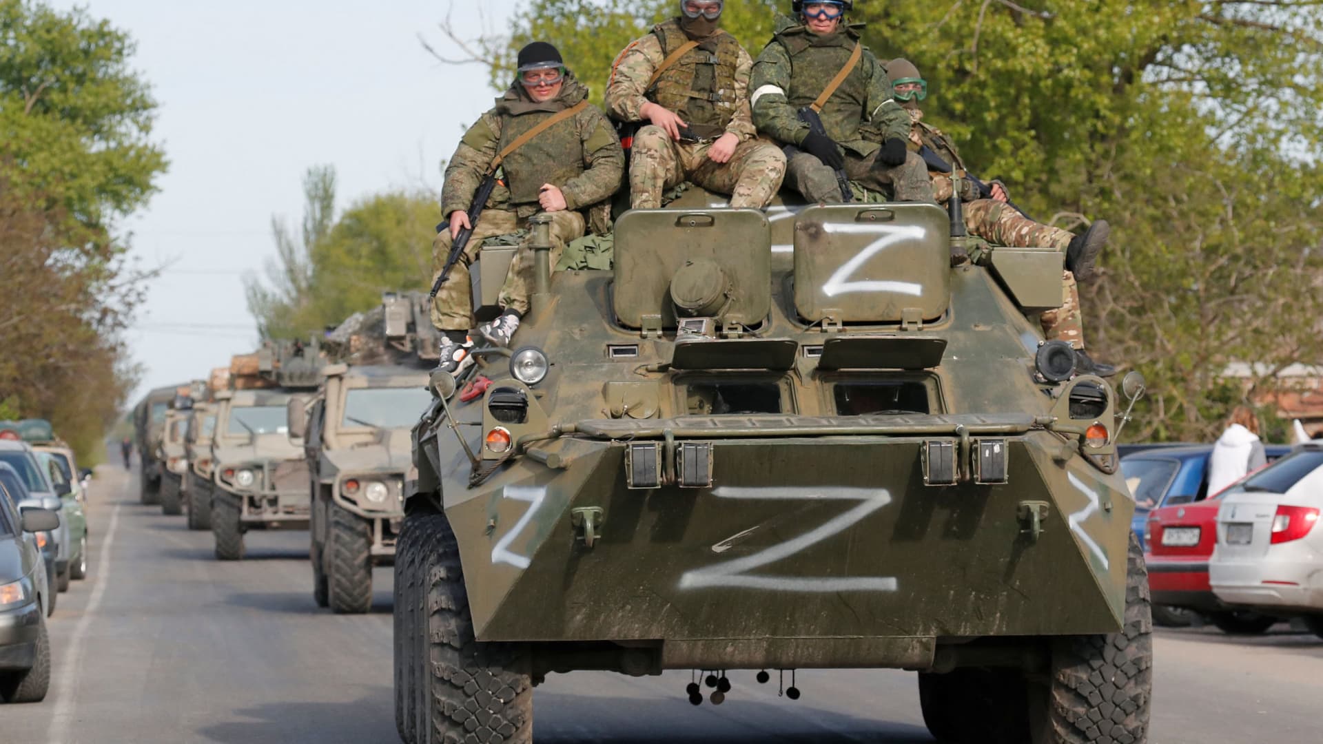 Service members of pro-Russian troops ride an armoured personnel carrier during Ukraine-Russia conflict in the village of Bezimenne in the Donetsk Region, Ukraine May 6, 2022.
