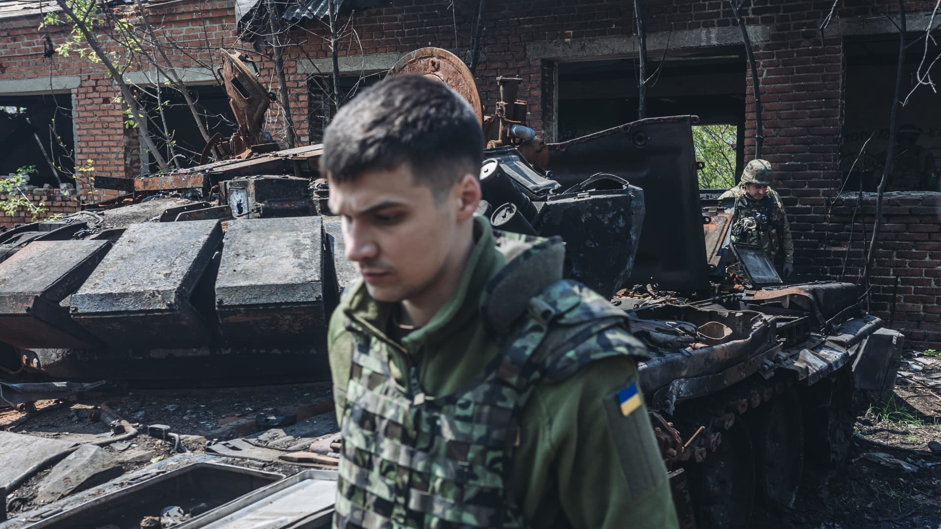 Ukrainian soldiers collect evidence of fighting around Kharkiv, Ukraine, 8 May 2022.