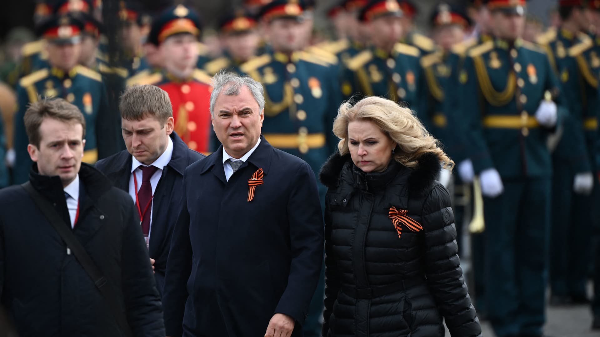 Speaker of Russia's lower house of parliament, the State Duma, Vyachslav Volodin and Deputy Prime Minister Tatyana Golikova arrive to watch the Victory Day military parade at Red Square in central Moscow on May 9, 2022. - Russia celebrates the 77th anniversary of the victory over Nazi Germany during World War II. (Photo by Kirill KUDRYAVTSEV / AFP) (Photo by KIRILL KUDRYAVTSEV/AFP via Getty Images)