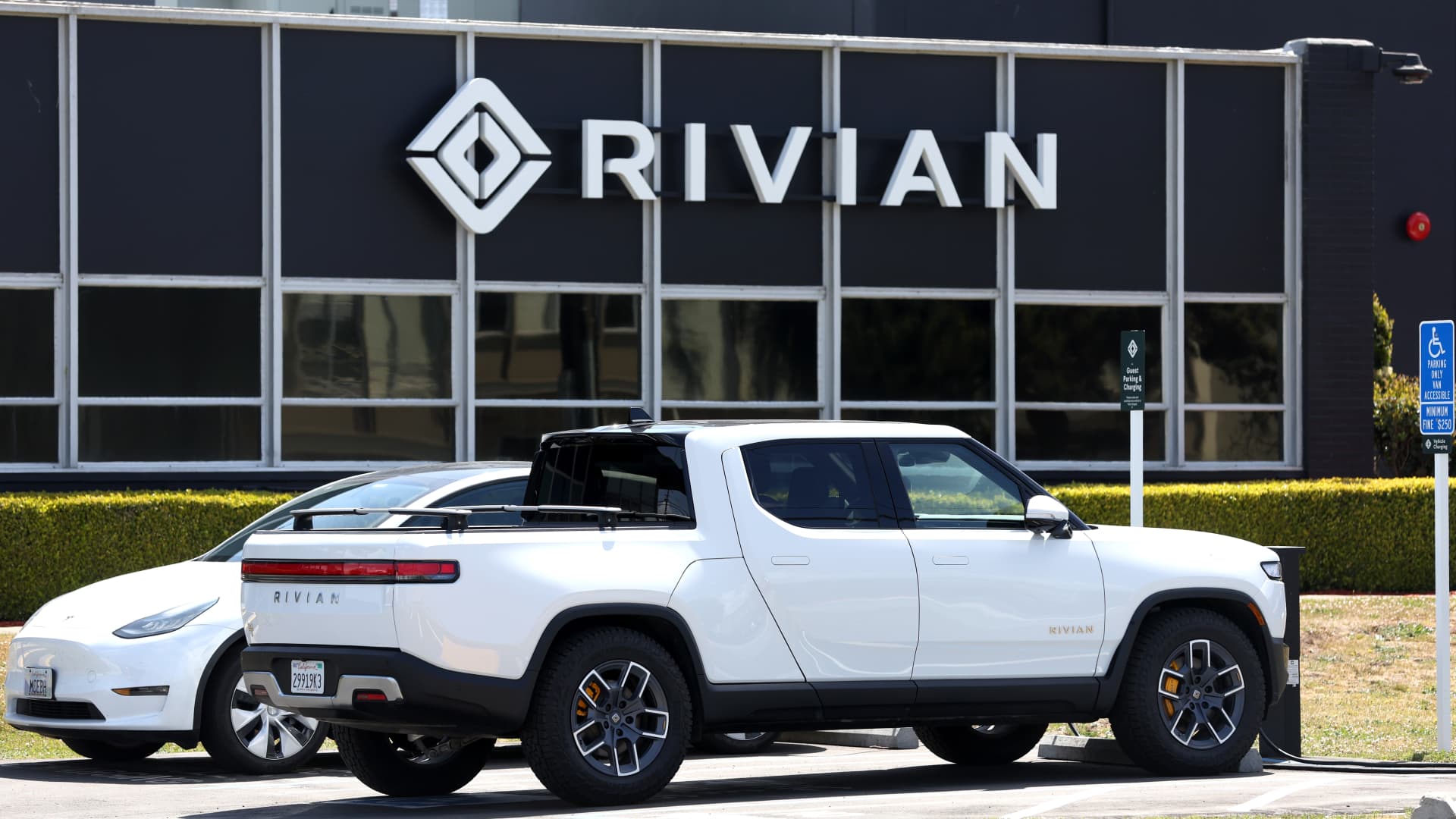 Rivian posts second-quarter revenue above estimates, but expects a wider loss for the year