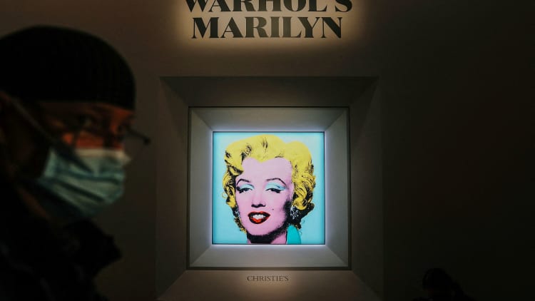 Andy Warhol's 'Shot Sage Blue Marilyn' sells for $195 million, breaks record for art sold by American artist