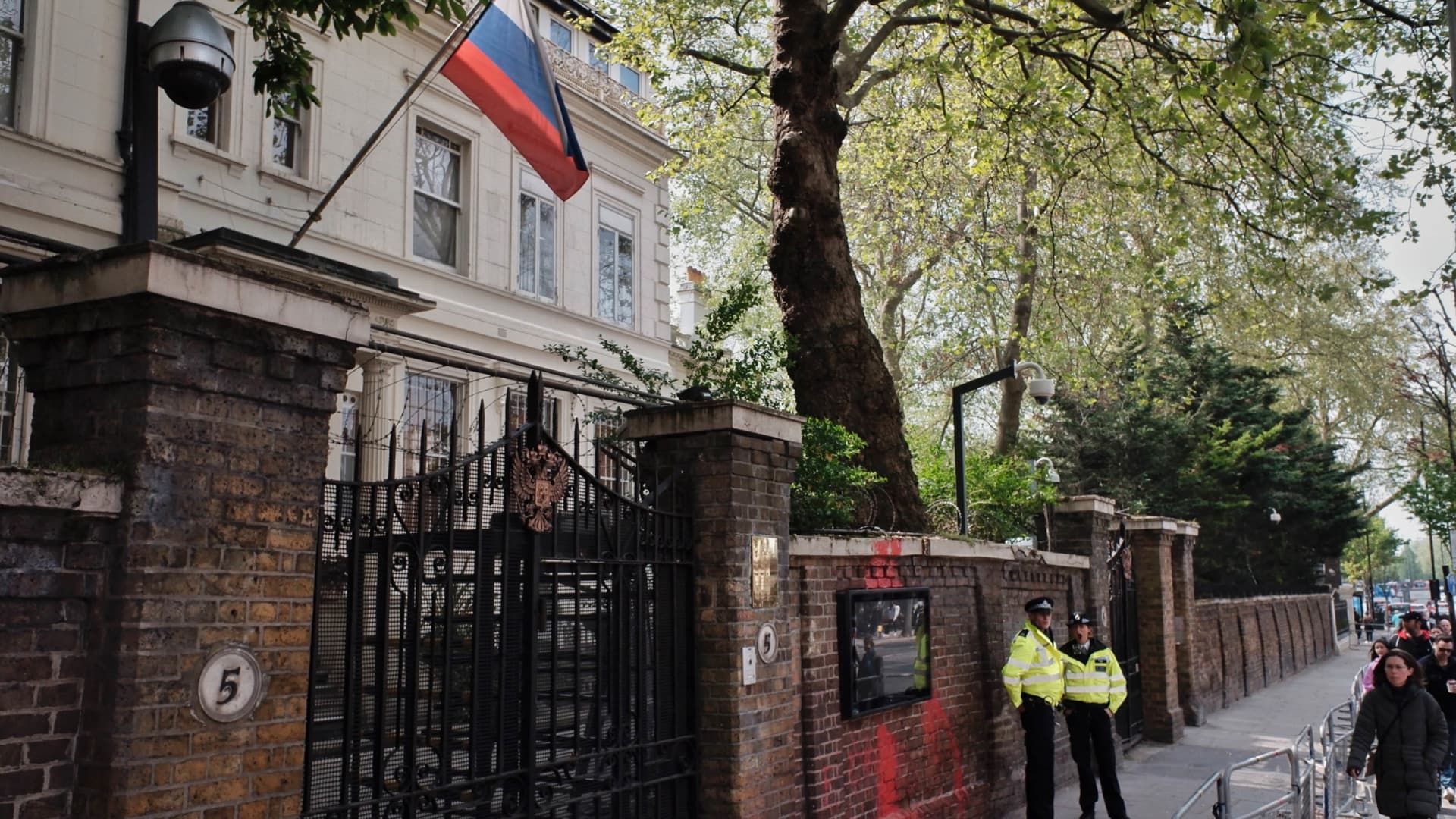 London Metro Police officers stand on guard outside Russia's embassy in London.