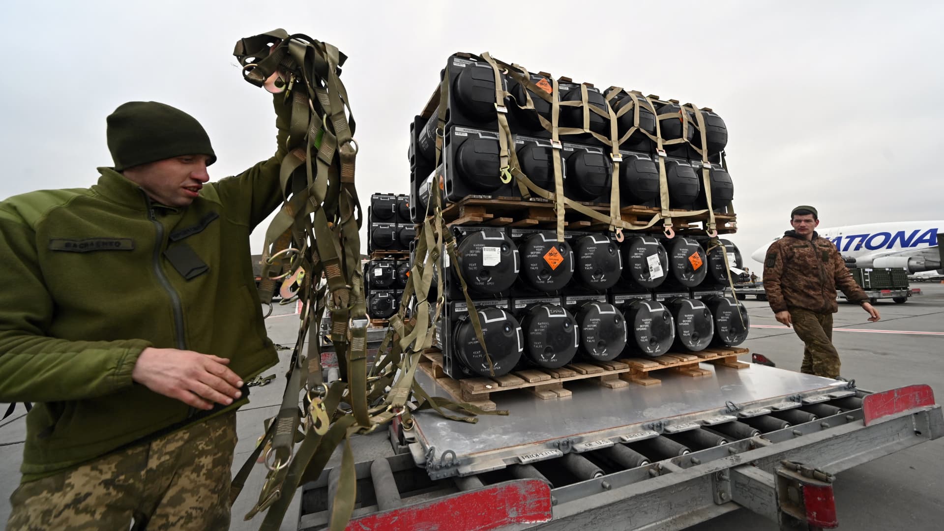 Ukrainian servicemen unload missiles provided by U.S. to Ukraine as part of a military support on Feb. 11, 2022. The U.S. has committed more than $4.5 billion on security assistance to Ukraine since the beginning of the Biden Administration.
