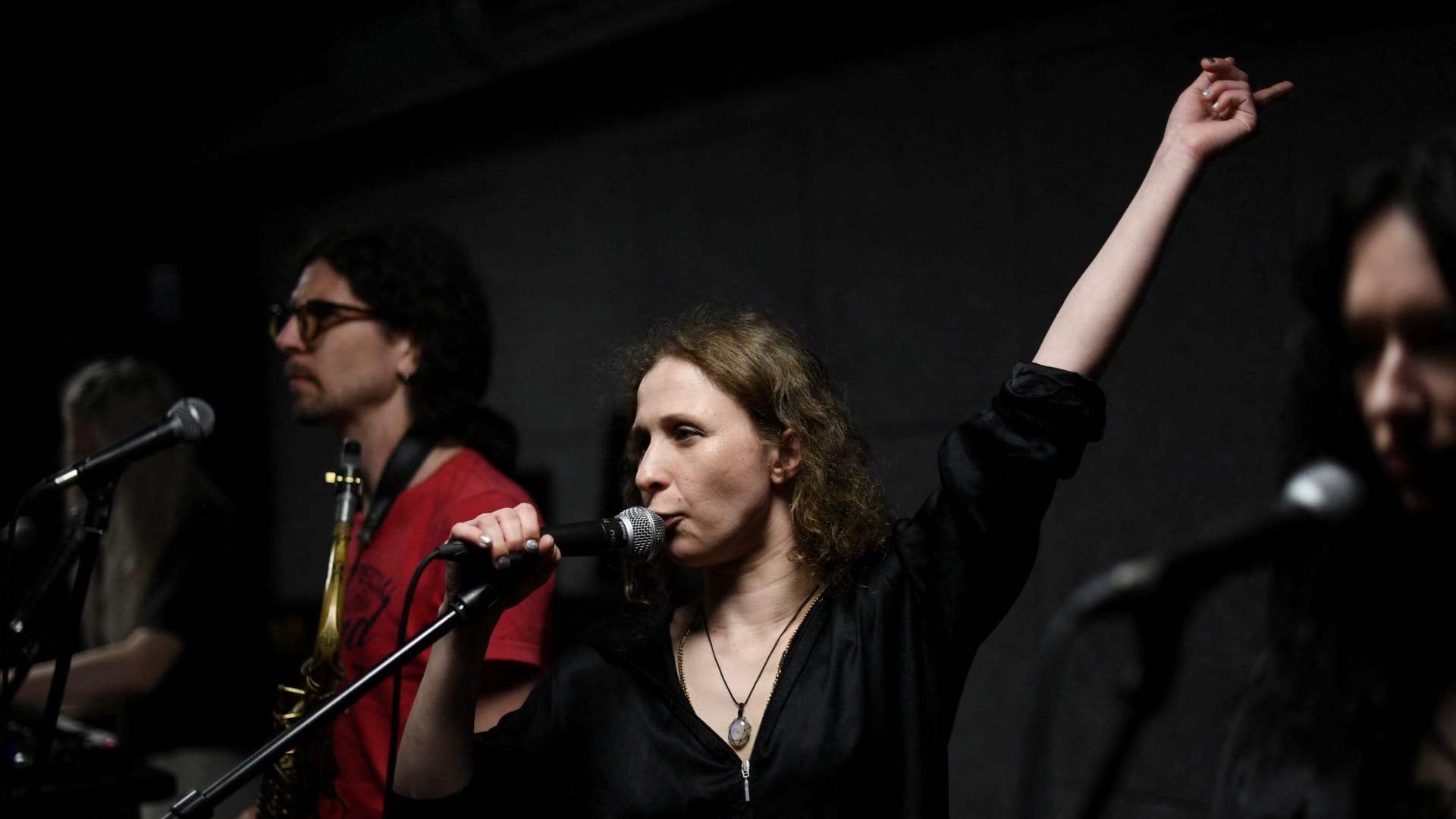 Russia's regime critical punk music group Pussy Riot member Maria Alyokhina performs with band members during a rehearsal, after she escaped a house arrest in Russia, in Berlin, Germany May 11, 2022. 