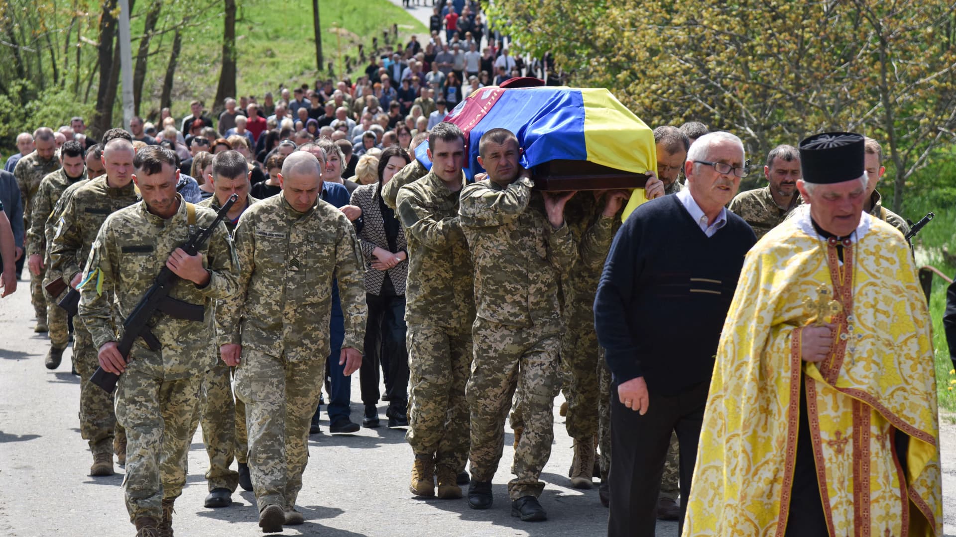 Soldiers carry a coffin of senior soldier Petro Sarakulo in the village of Kulchytsia, Lviv region. The funeral of senior soldier Petro Sarakulo is held in his native village of Kulchytsi, Lviv region. Due to the Russian military invasion of Ukraine on February 24, 2022, he went to serve in the Armed Forces of Ukraine.