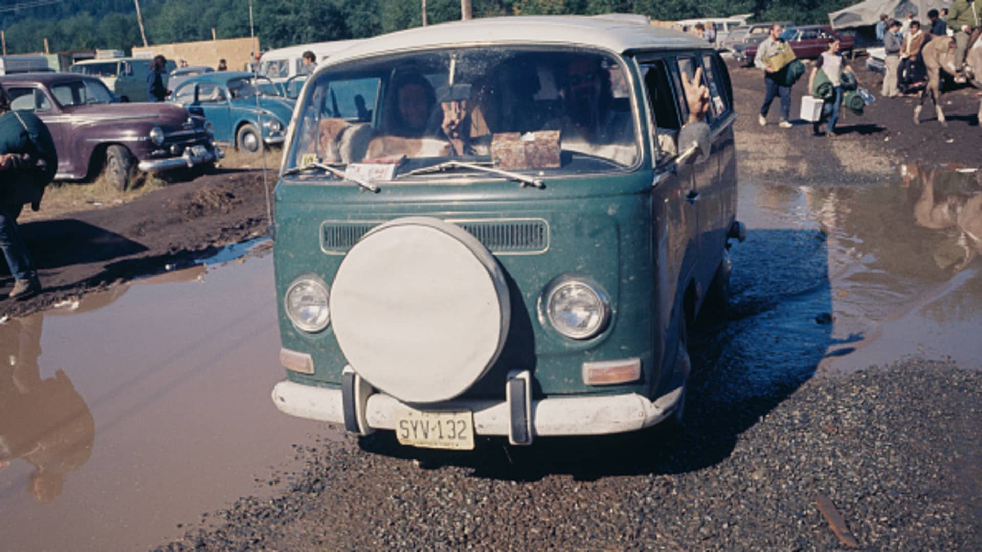 This image, from 1970, shows people driving a version of the Volkswagen Microbus at a rock festival in Oregon.