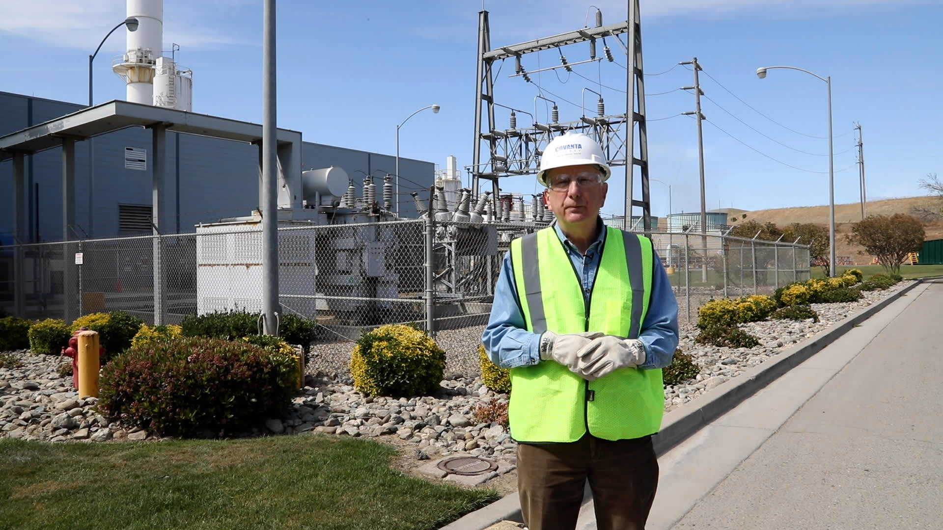 Covanta chief sustainability officer Paul Gilman stands in front of the Stanislaus County switchyard on April 13, 2022, where the incineration of waste generates enough electricity to power 18,000 homes in the area.