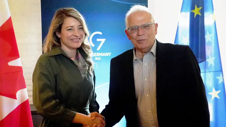 Canadian Foreign Minister Melanie Joly and High Representative of the European Union for Foreign Affairs and Security Policy Josep Borrell shake hands after bilateral talks during the G7 Foreign Ministers meeting in Wangels, northern Germany, on May 14, 2022.
