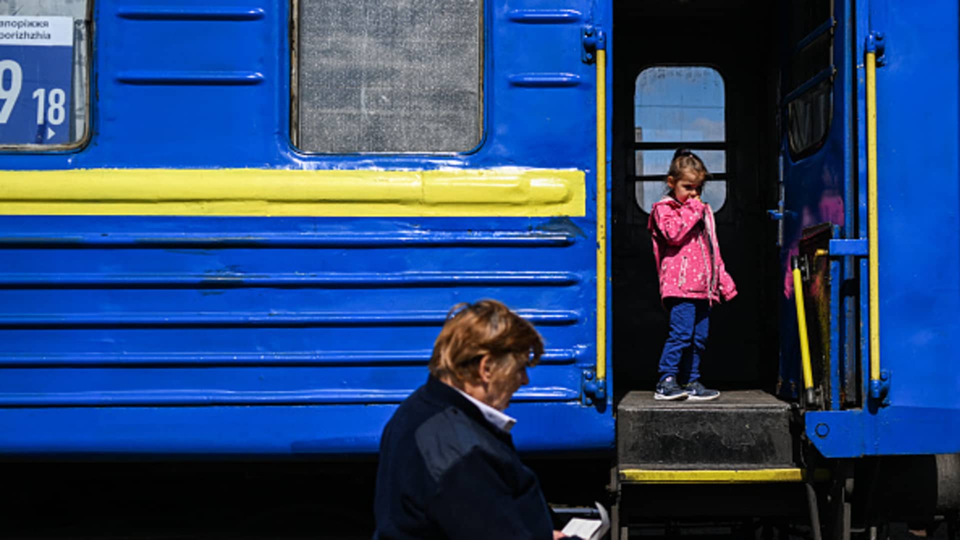 Ukrainians wait to board a train towards Zaporizhzia at the Main train station in Lviv, Ukraine on May 14, 2022.